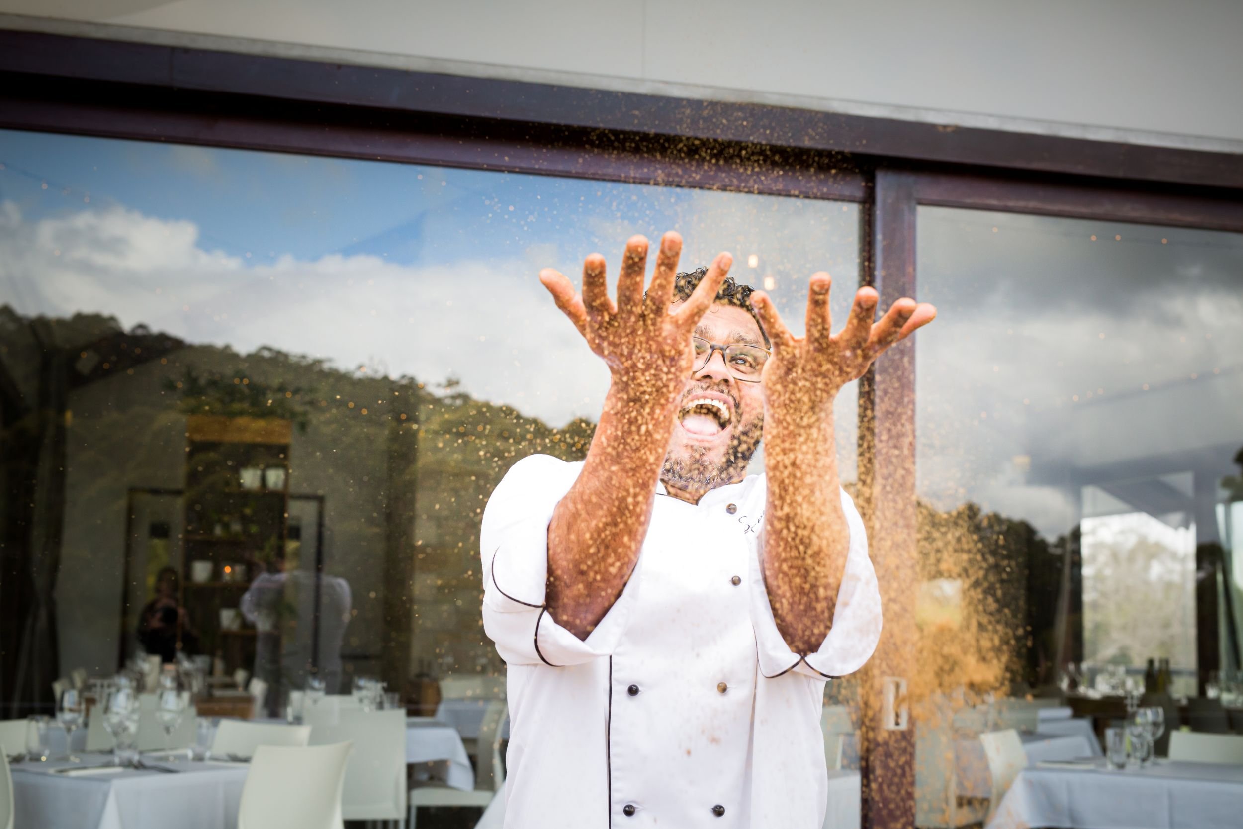 Chef Silas Masih celebrating on the balcont at his Austalian wedding venue