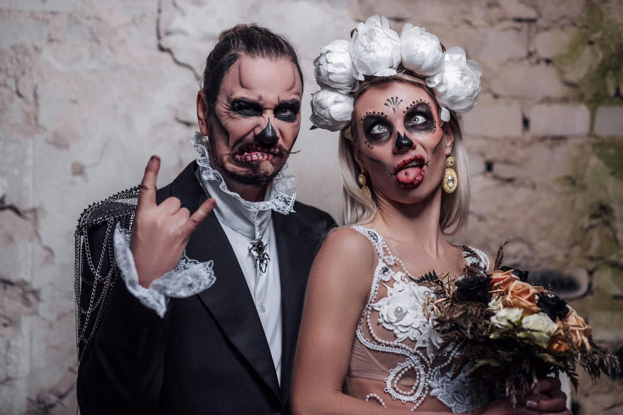 Wedding couple dresses in day of the dead costumes