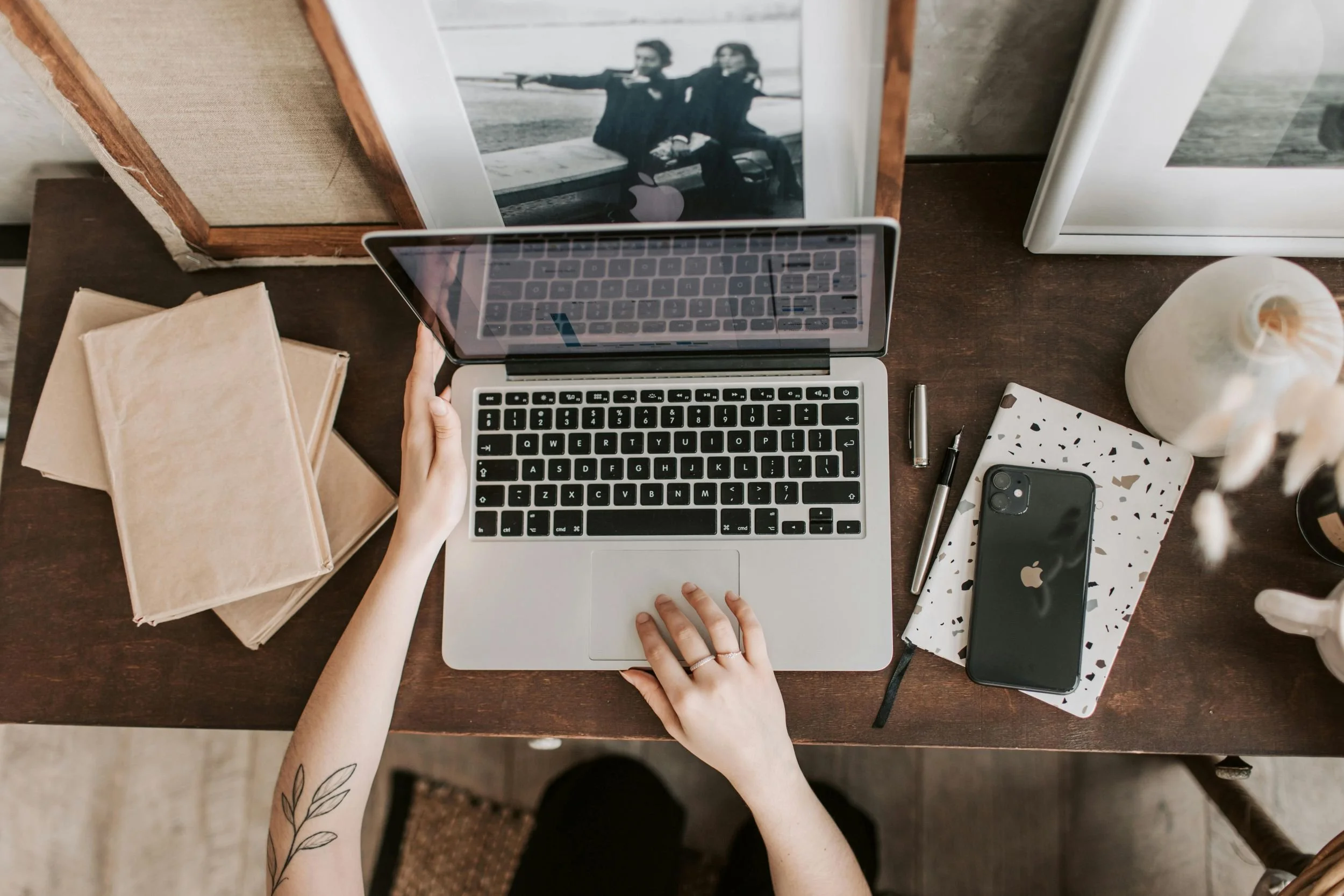 Woman researching wedding vendors on a laptop