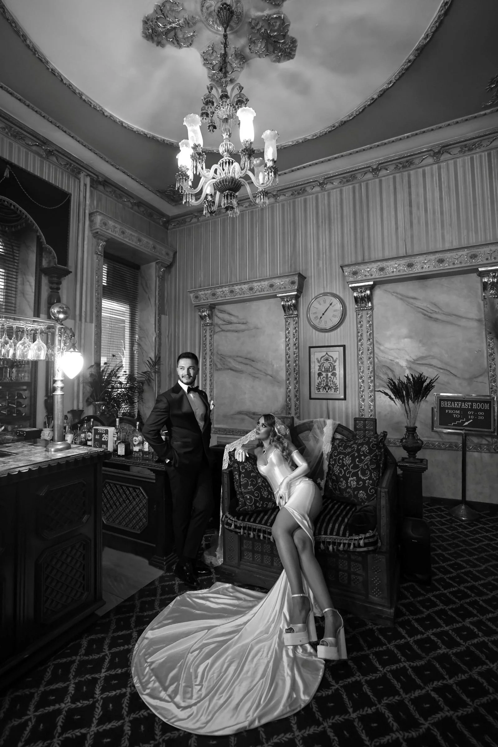 A beautiful wedding couple in a grand hotel bar
