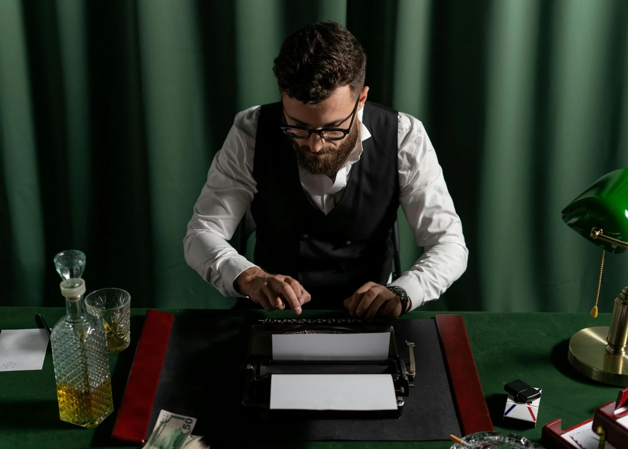 An accountant at his desk working out wedding vendor pricing
