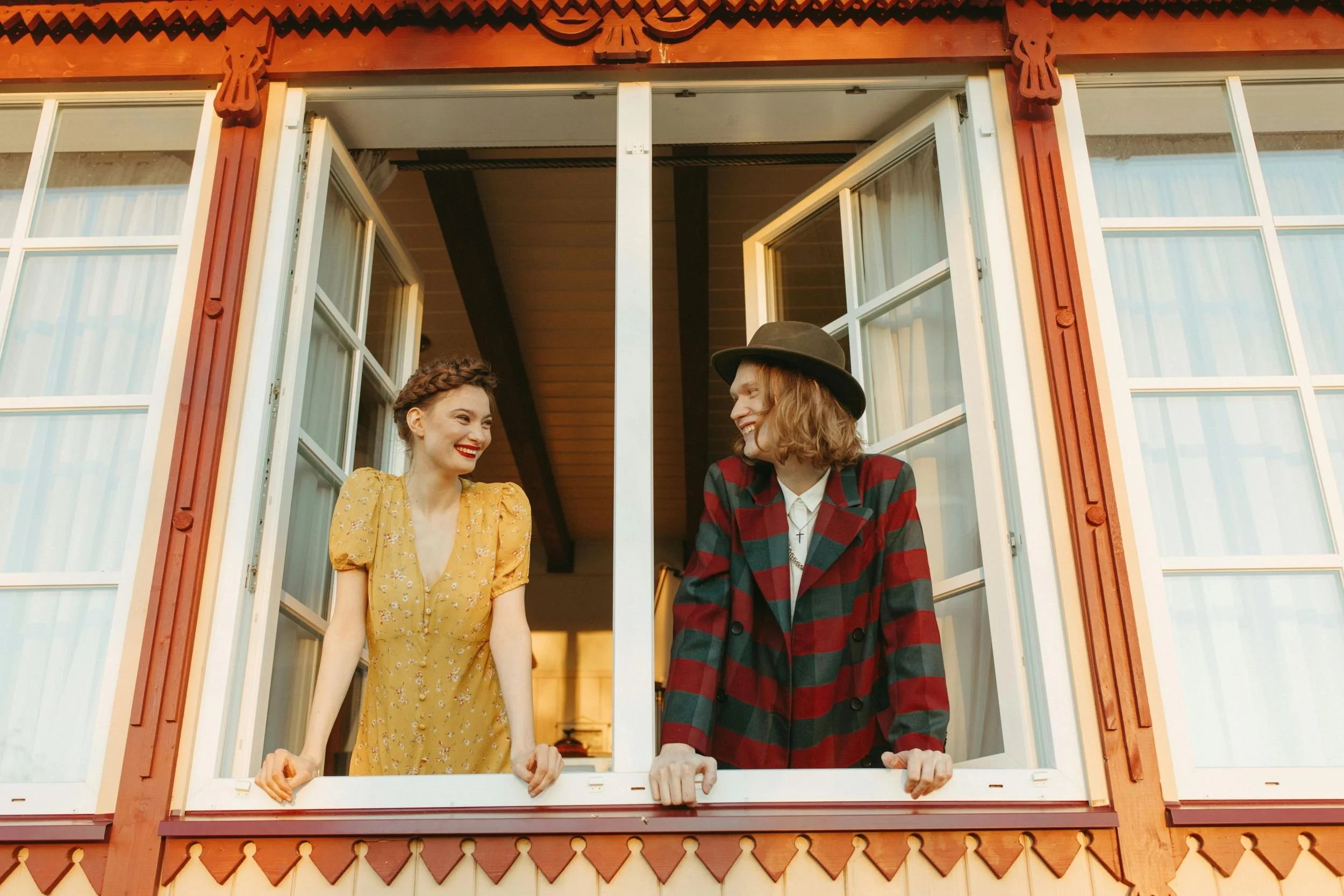 Retro couple looking out the window