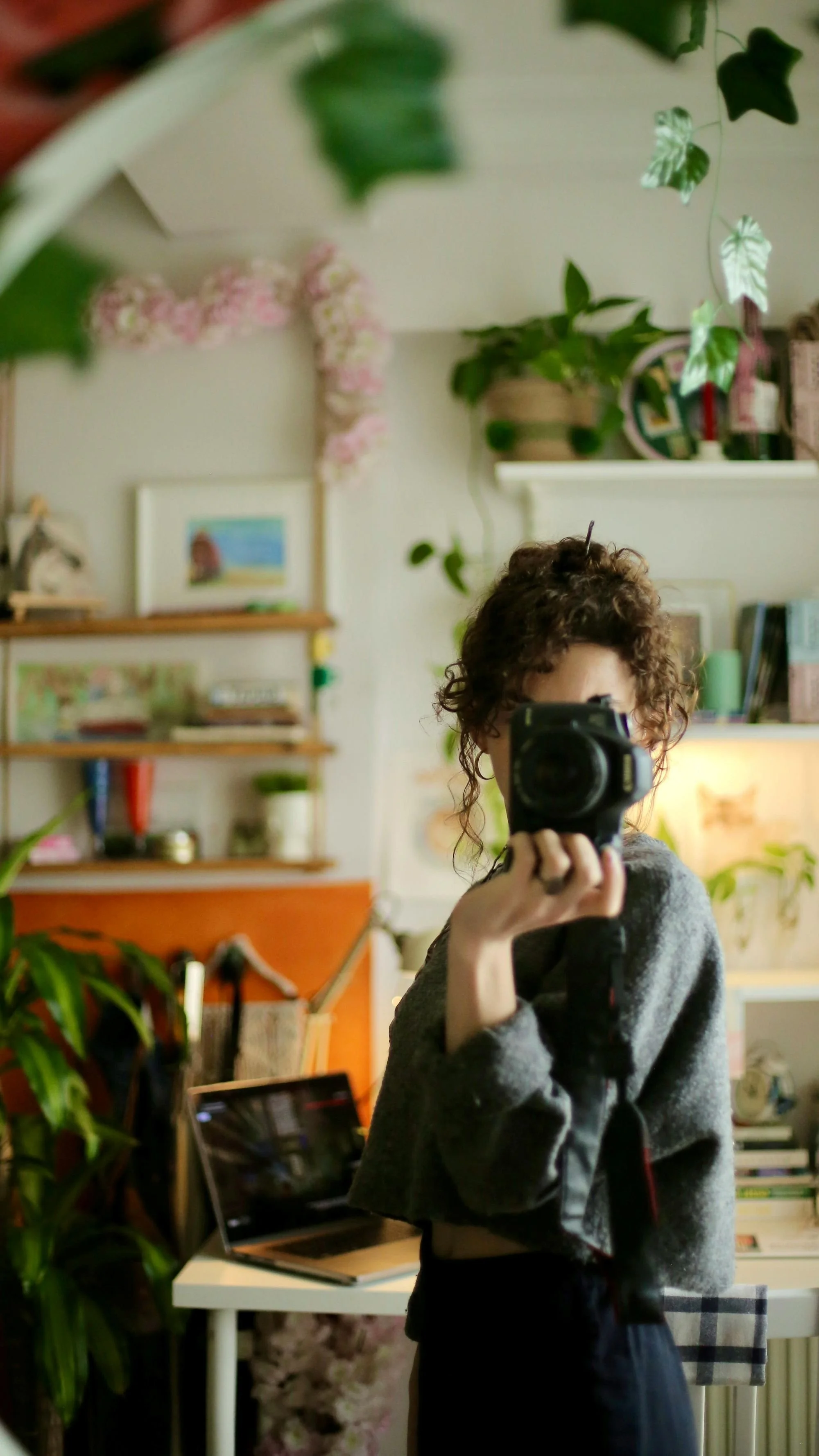 A wedding photographer in her office space