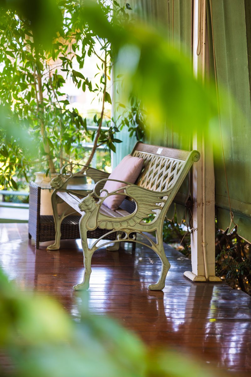 Cosy bench on a timber floor verandah