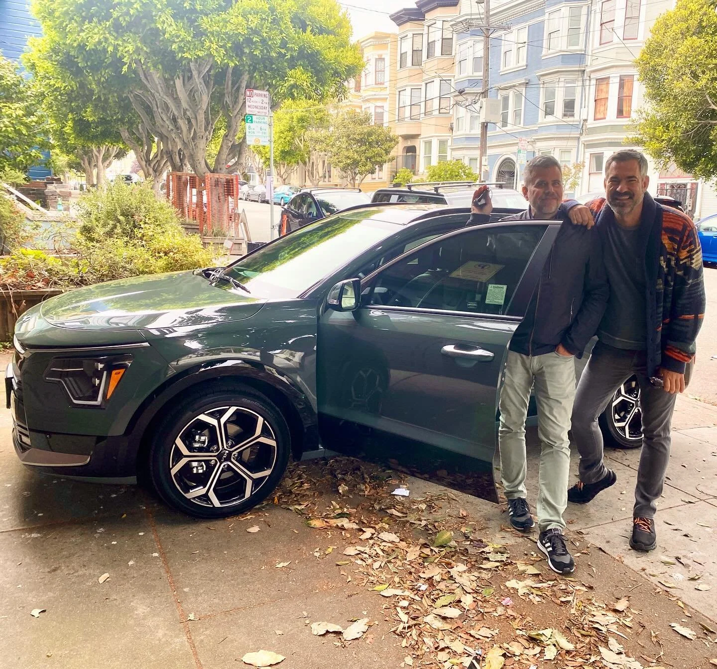 Smiles That Say It All.

The joy is unmistakable as these happy new owners take delivery of their brand-new Kia Niro Hybrid, proudly parked in their driveway. After more than a decade without a vehicle, this sleek subcompact crossover is more than ju