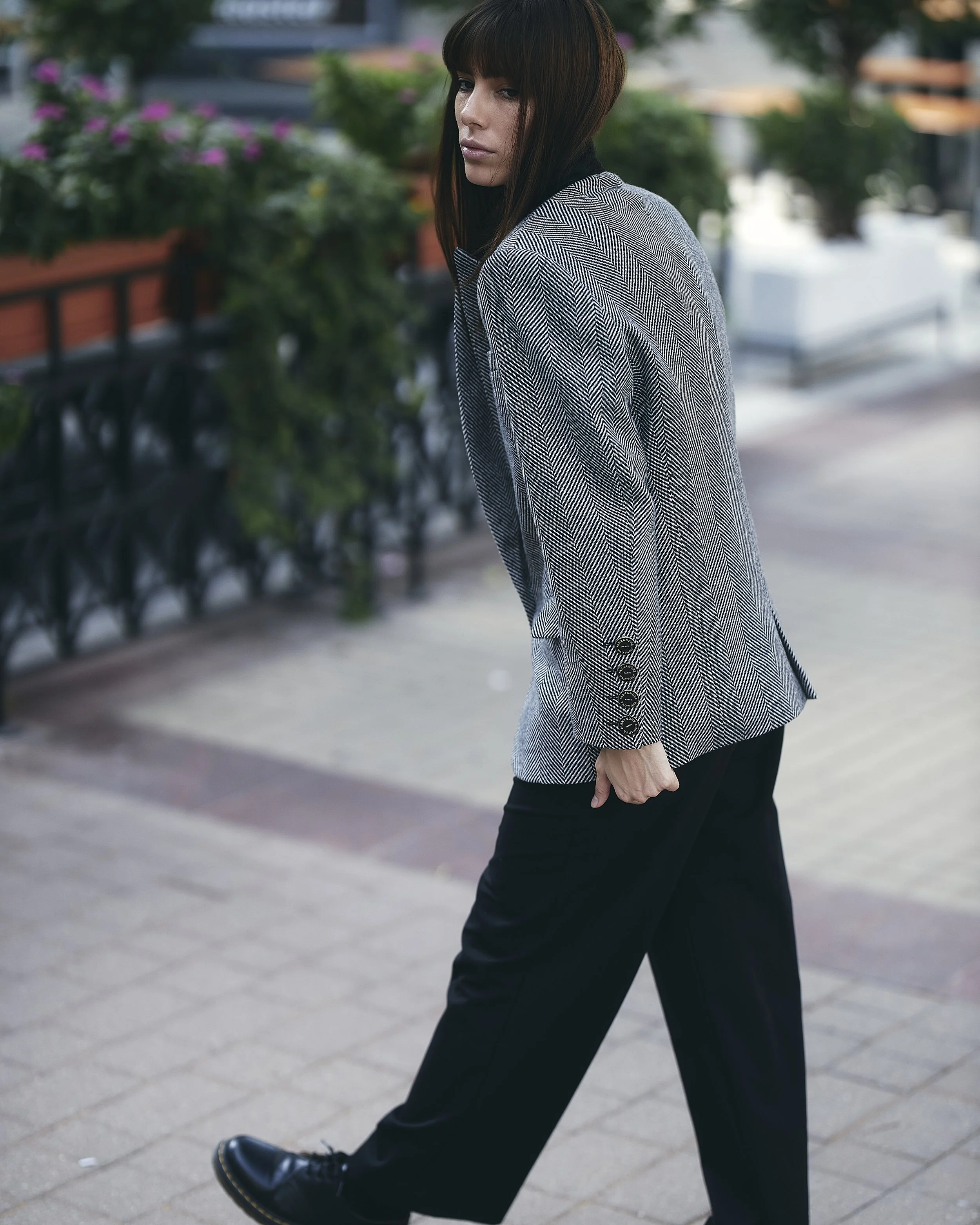 outdoor fashion image of model walking on street