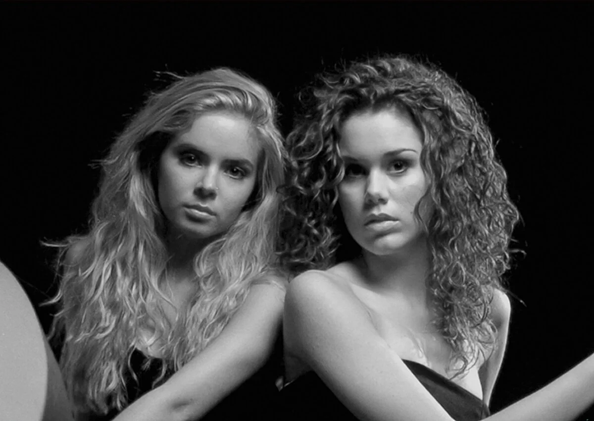 Pair of contrasting fashion models B/W