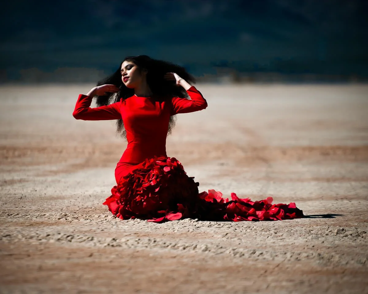 Desert setting for glamour model, ruby red