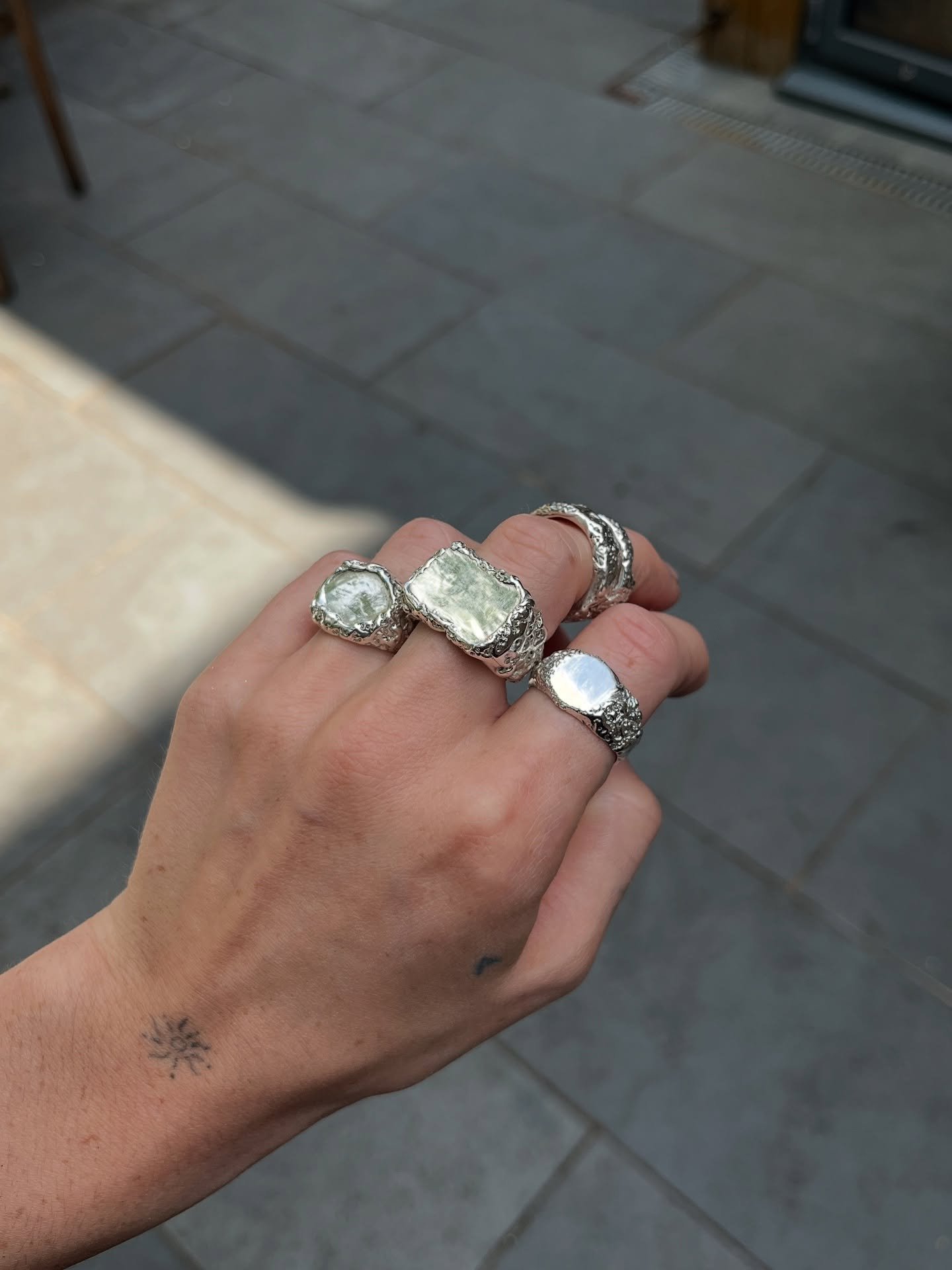 new signets (+ one custom) in the signature texture yet to be named 🍾

100% recycled metals 

available sooooon ❤️&zwj;🔥