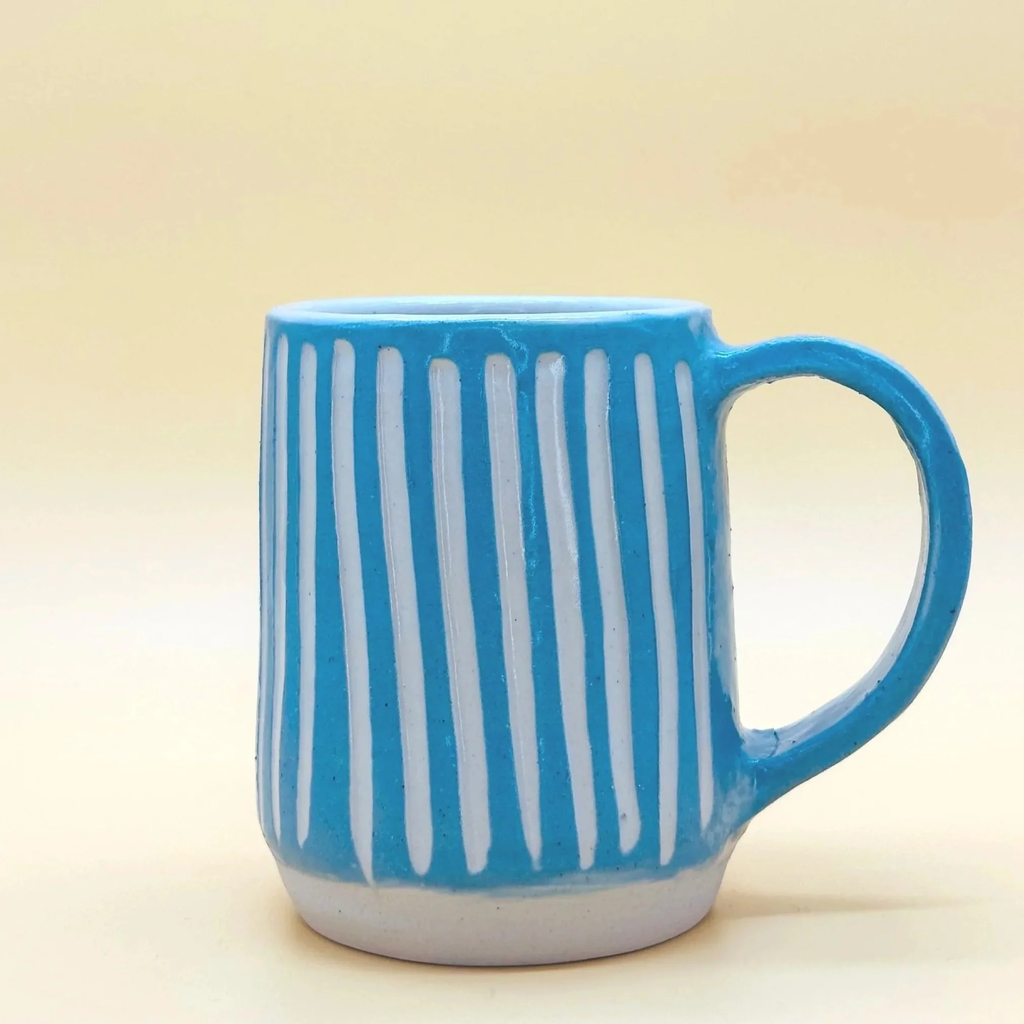 HAND-CRAFTED MUGS (ARTIST BRIAN BURGESS)