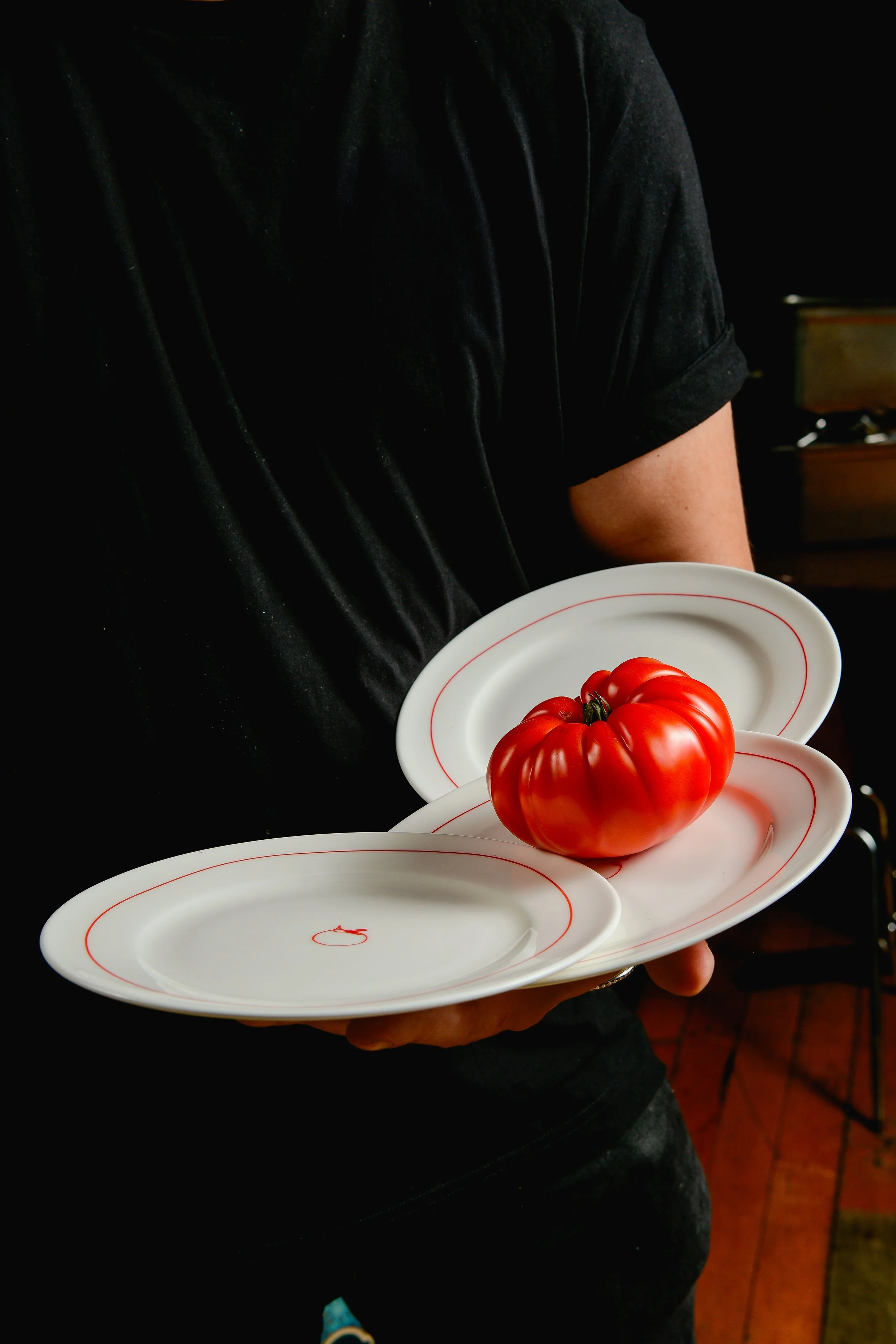 Tomato_Naked Tomato Branded Plates_NakedTomato_MaxFlatow 1.jpg