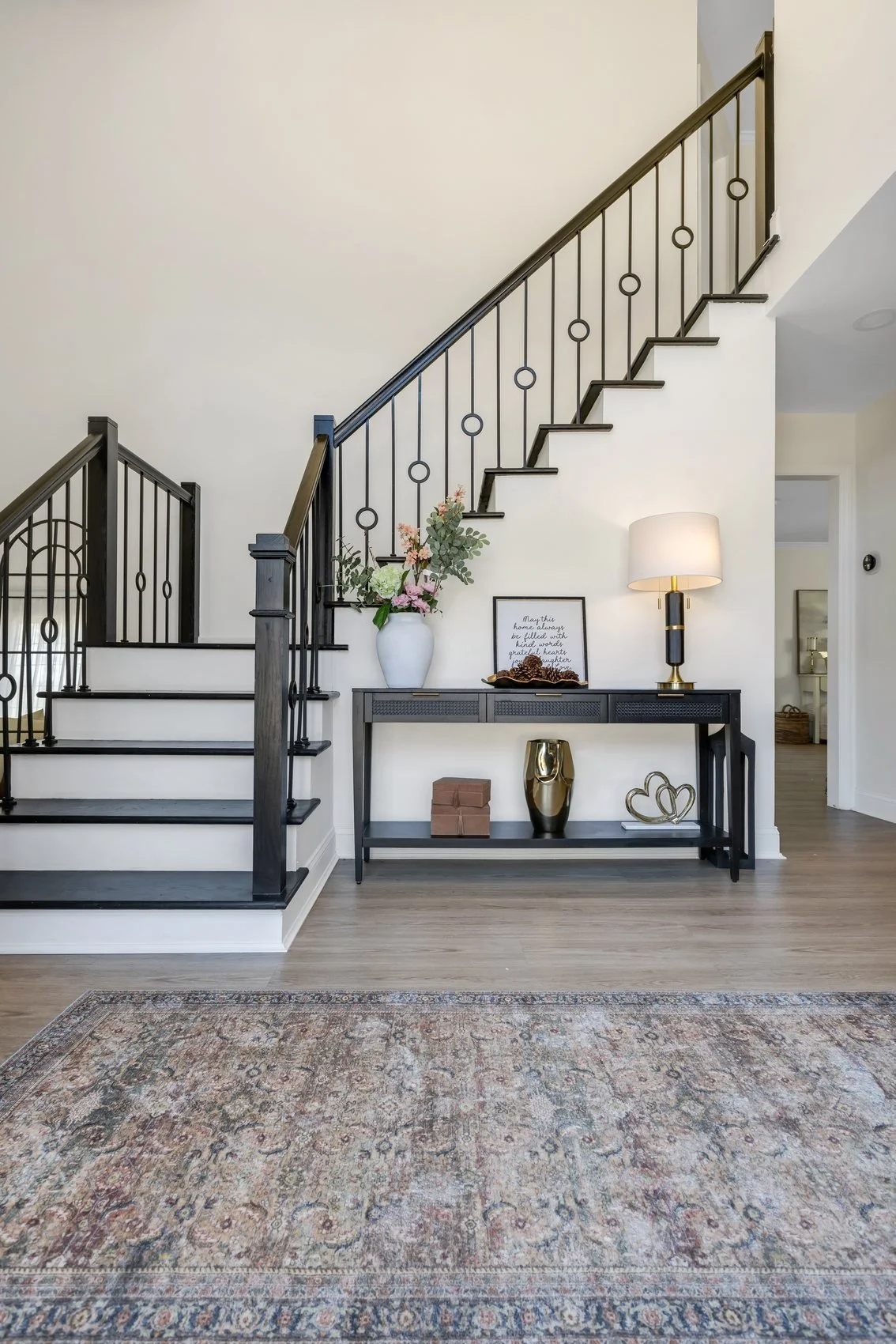 Renovated staircase with oak treads and ironwork balustrades, Roswell GA