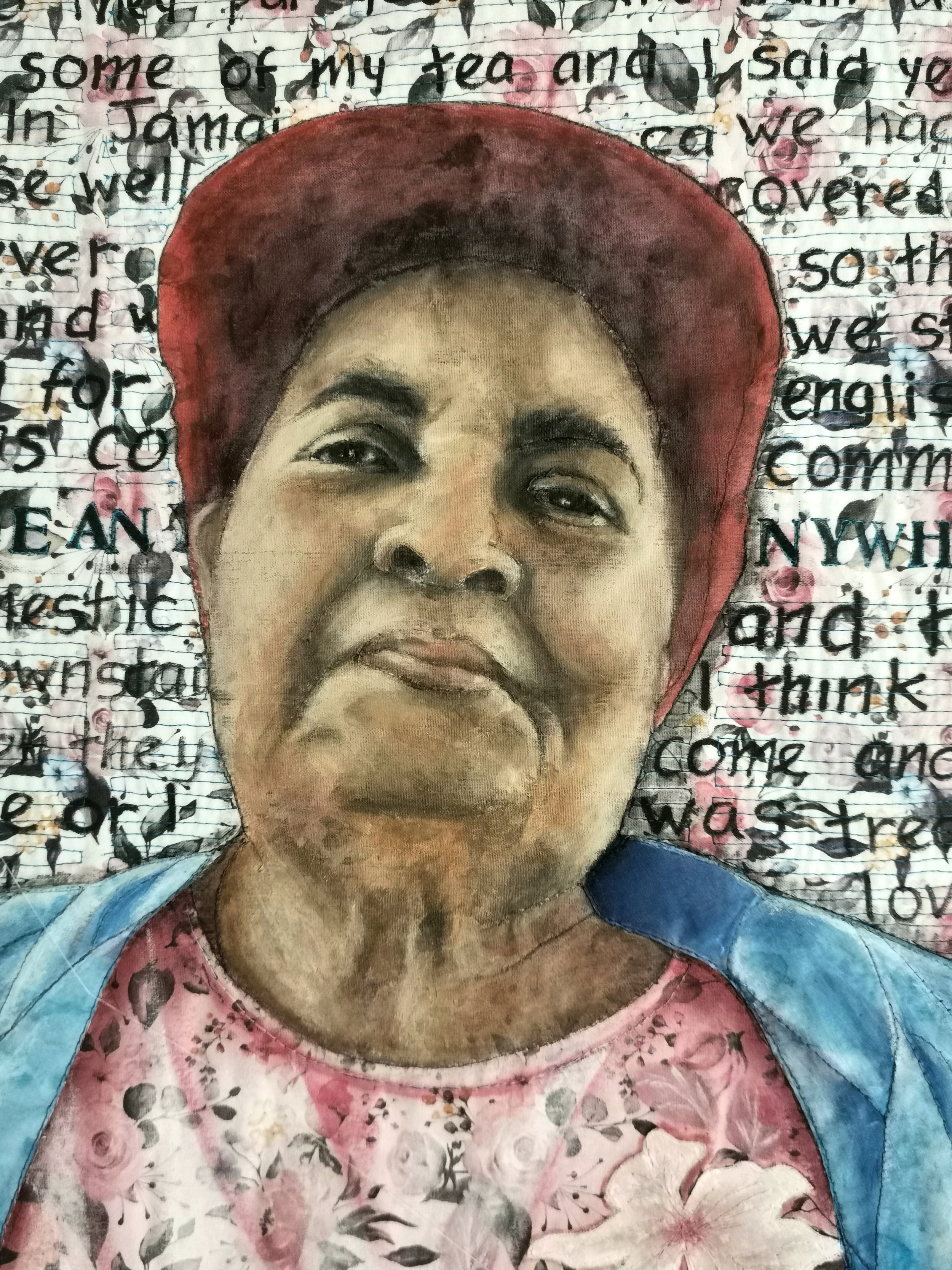 Portrait of a person wearing a red hat, pink floral shirt, and blue jacket. The background features handwritten text on a floral and lined paper design.