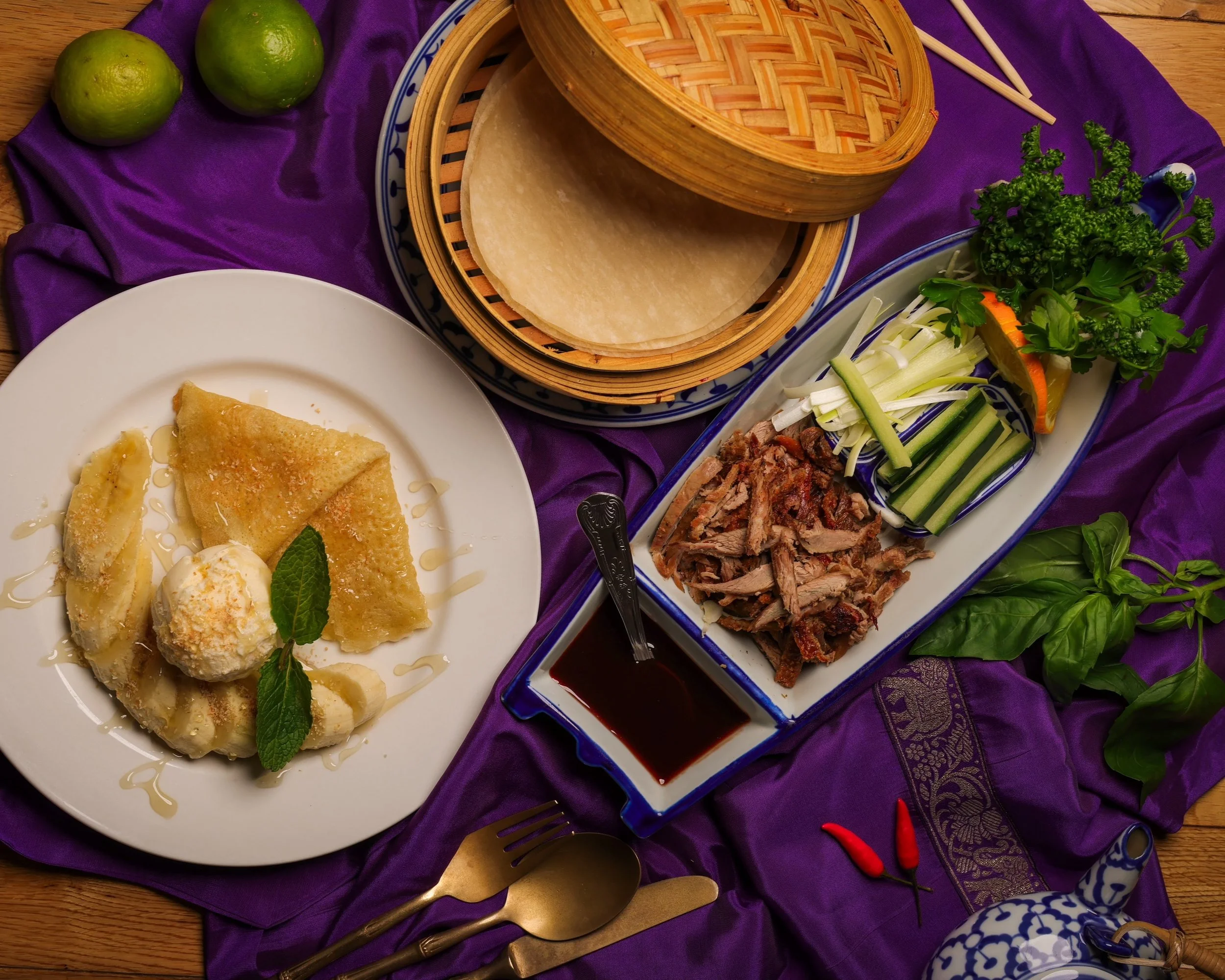 Thai coconut pancake with ice cream and fresh banana alongside savoury duck pancakes at Jup Jup Thai Restaurant and Bar in Ludlow.