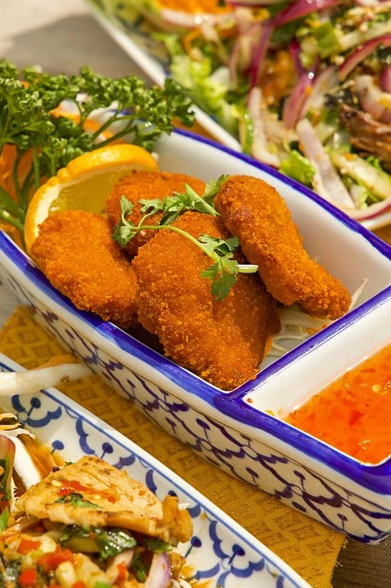 Close-up of Thai prawn cakes at Jup Jup Thai Restaurant in Ludlow, made with prawn and pork and fried until crisp and golden.