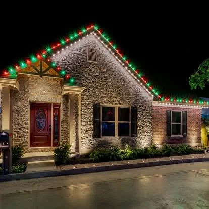 X Series Classic — traditional holiday roofline with evenly spaced bulbs at night