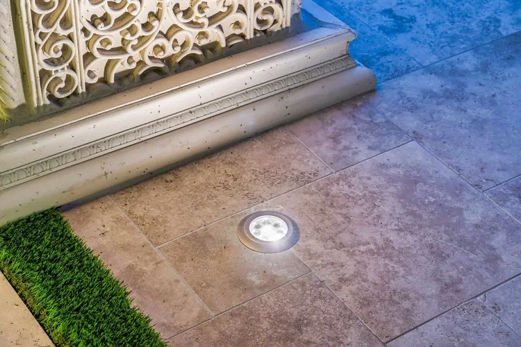 In‑grade well lights in paver walkway