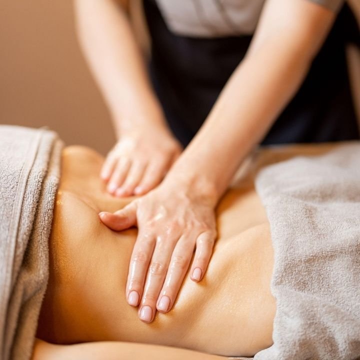 Abdominal massage for constipation and bloating relief, supporting digestive discomfort in Leicester.