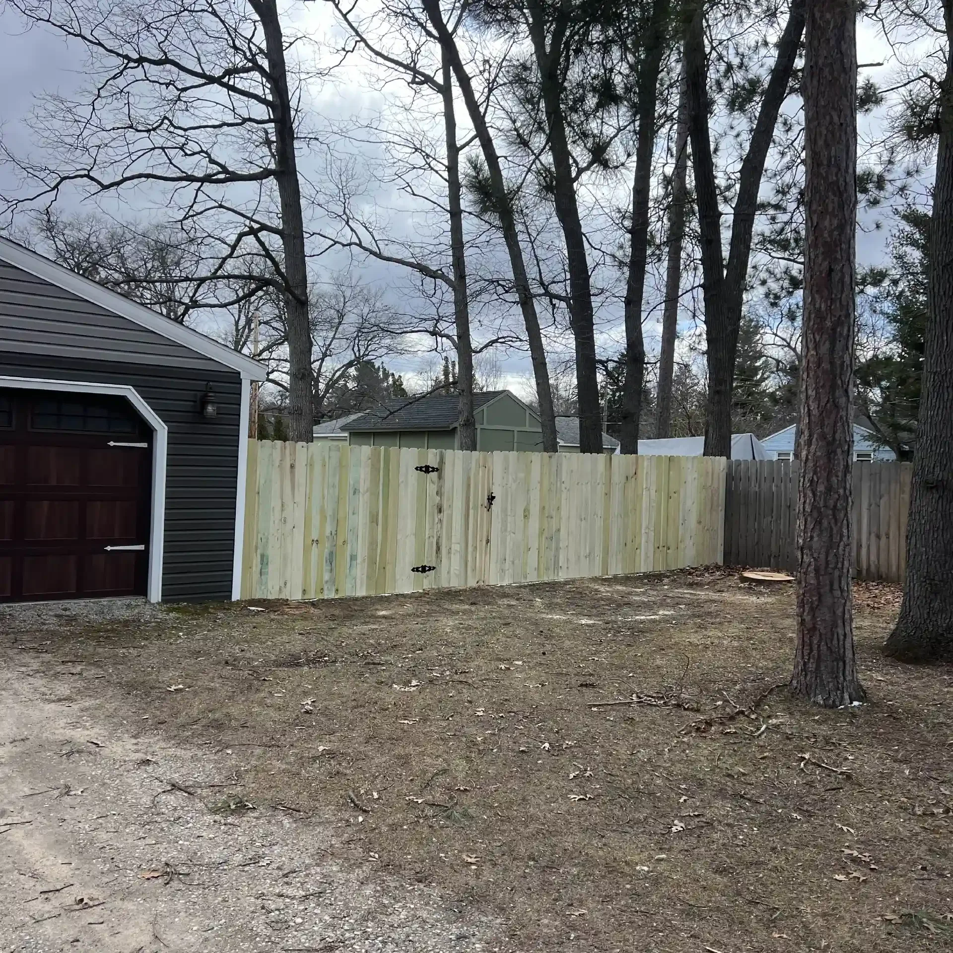 pressure treated wood fence installation traverse city mi