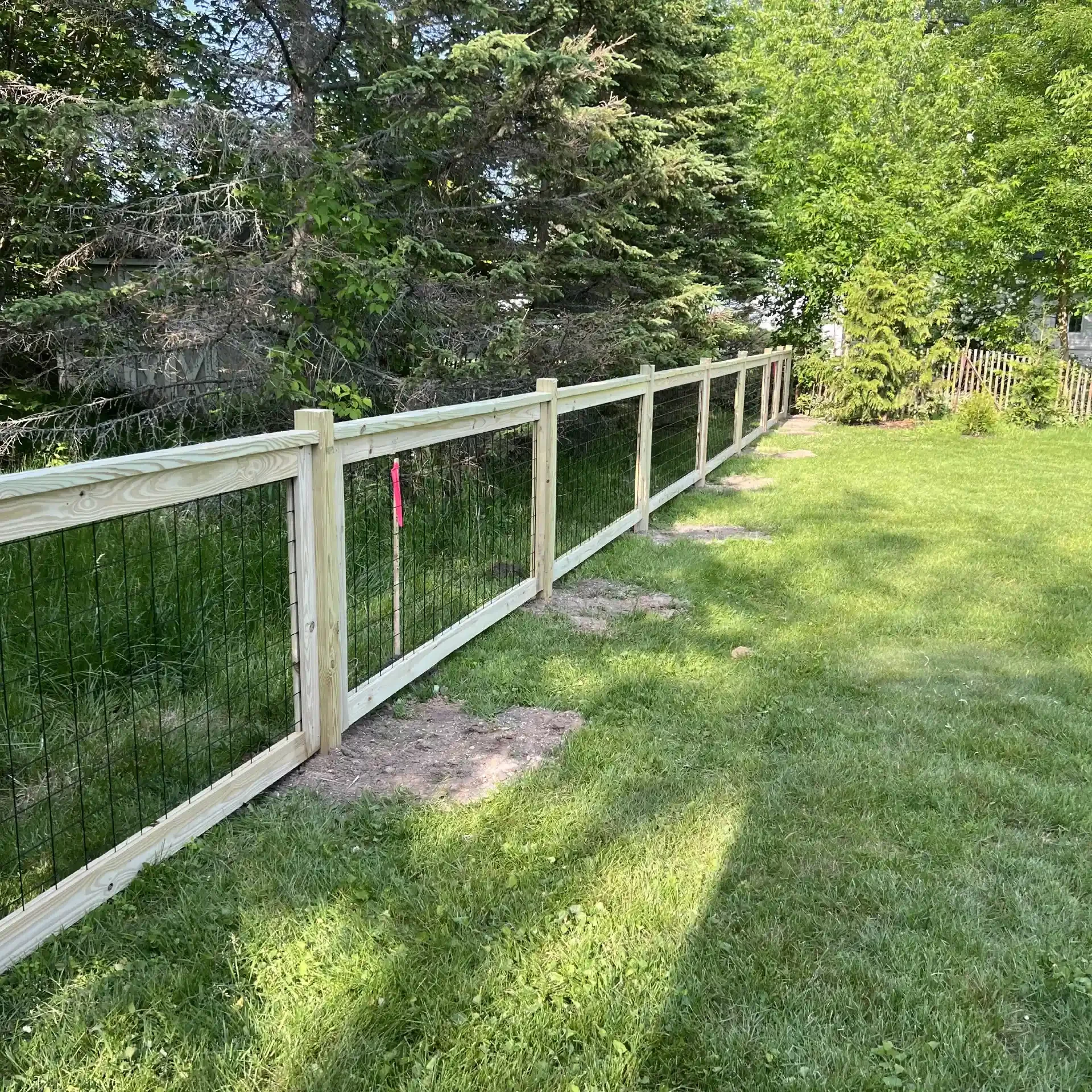 wood framed welded wire fence in michigan
