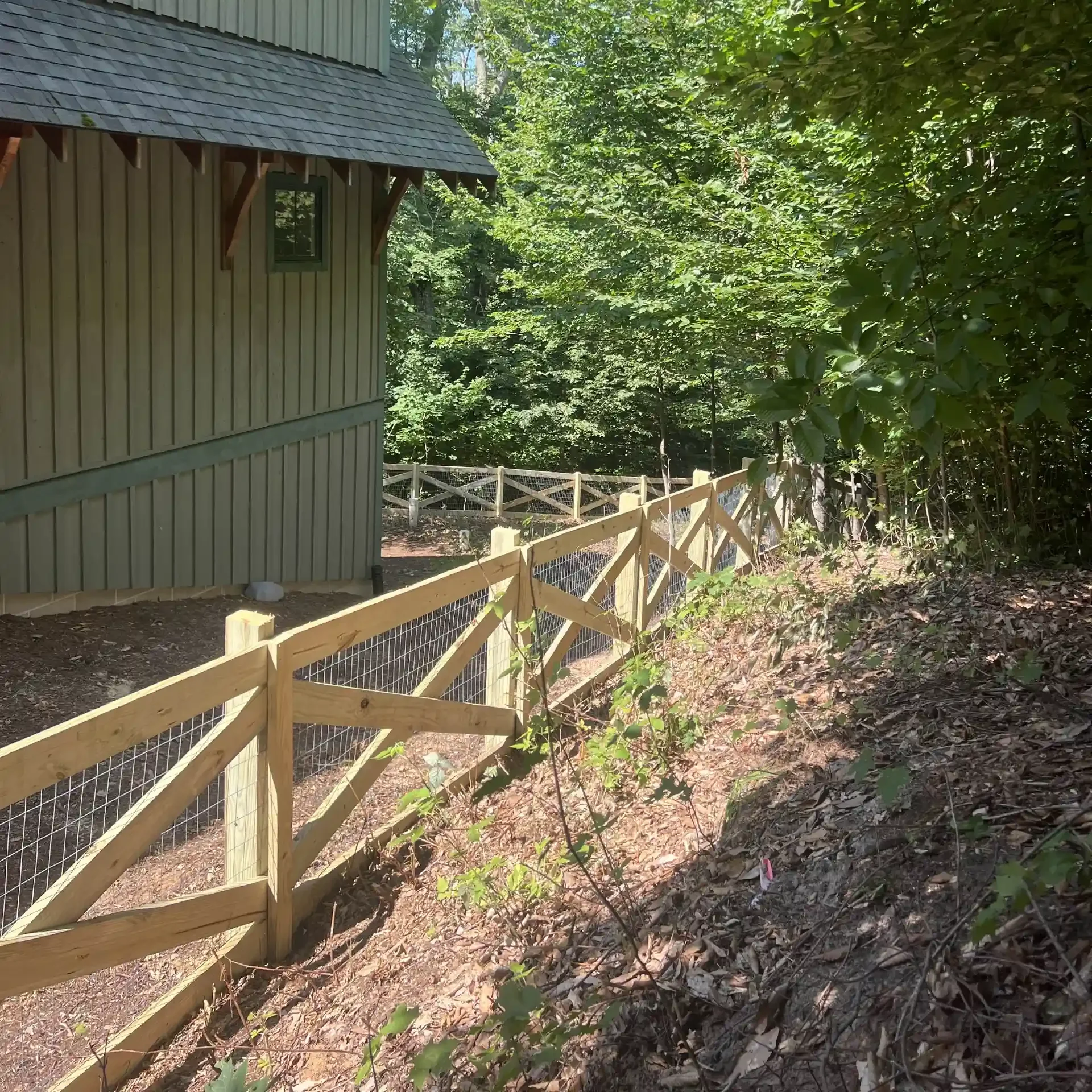 wood framed welded wire fence install
