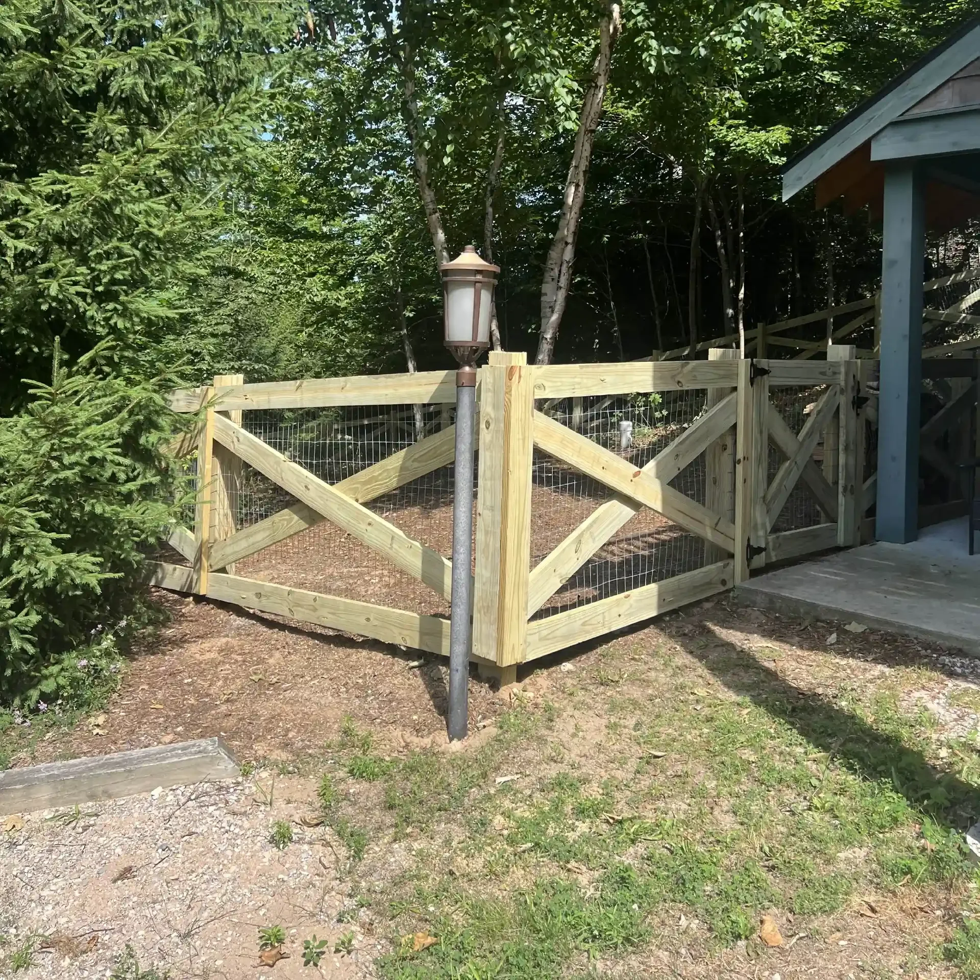 wood framed welded wire fence in traverse city mi