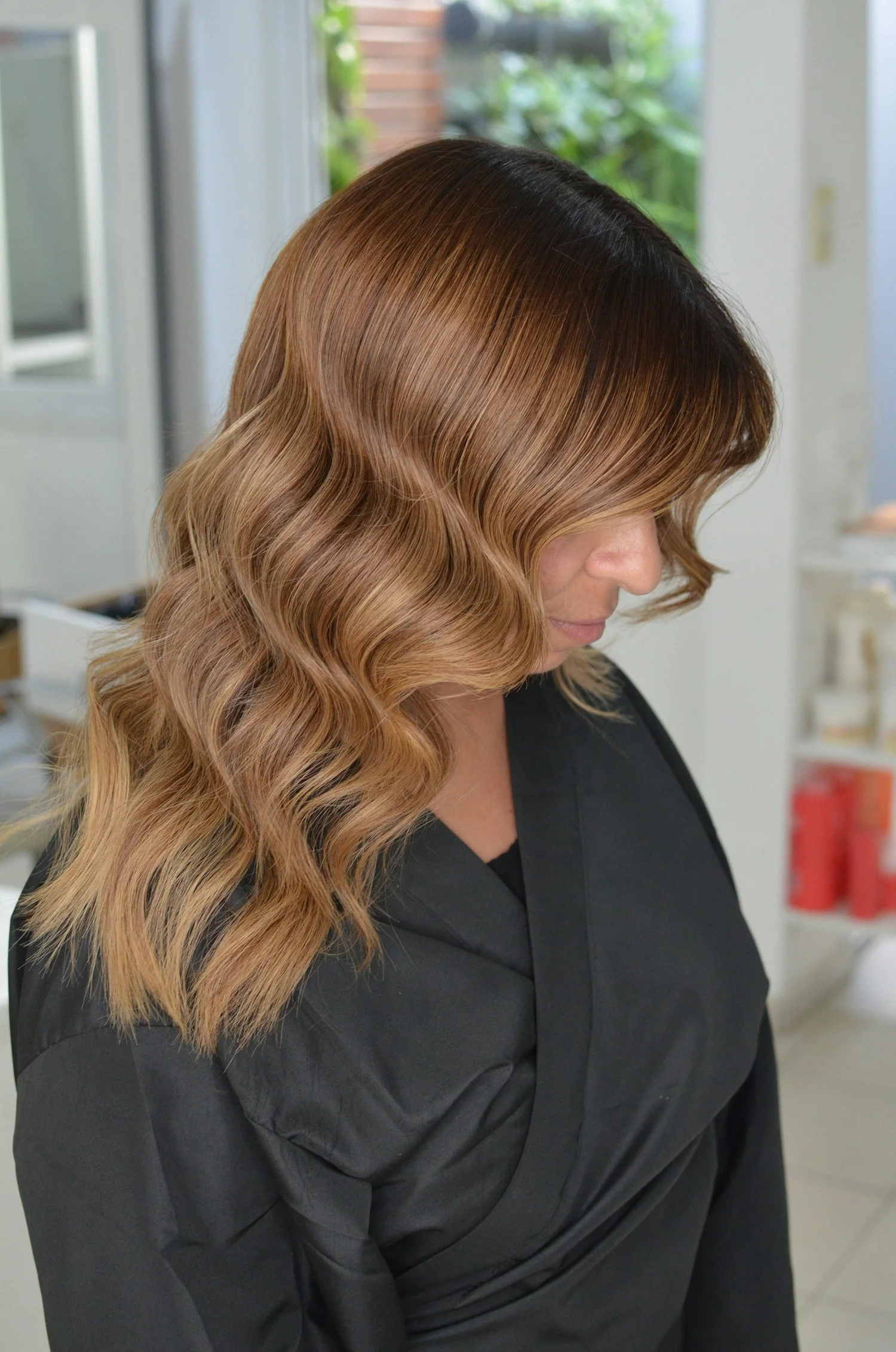 Soft dimensional brunette waves after a salon appointment