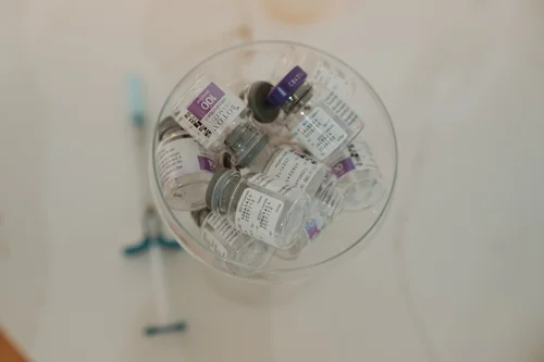 Neuromodulator vials gathered in a glass dish — view more on Instagram