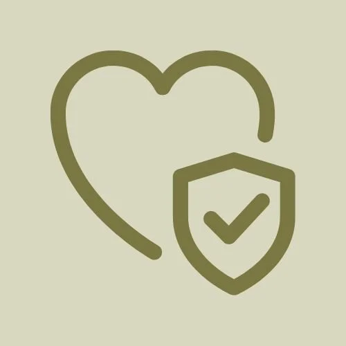 Illustration of a heart with a shield and checkmark, symbolizing safety, protection, and trusted mental health care at Walls Counseling.
