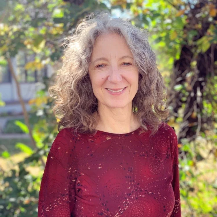 Headshot of Cate Snow., MA, LPC, therapist at Walls Counseling