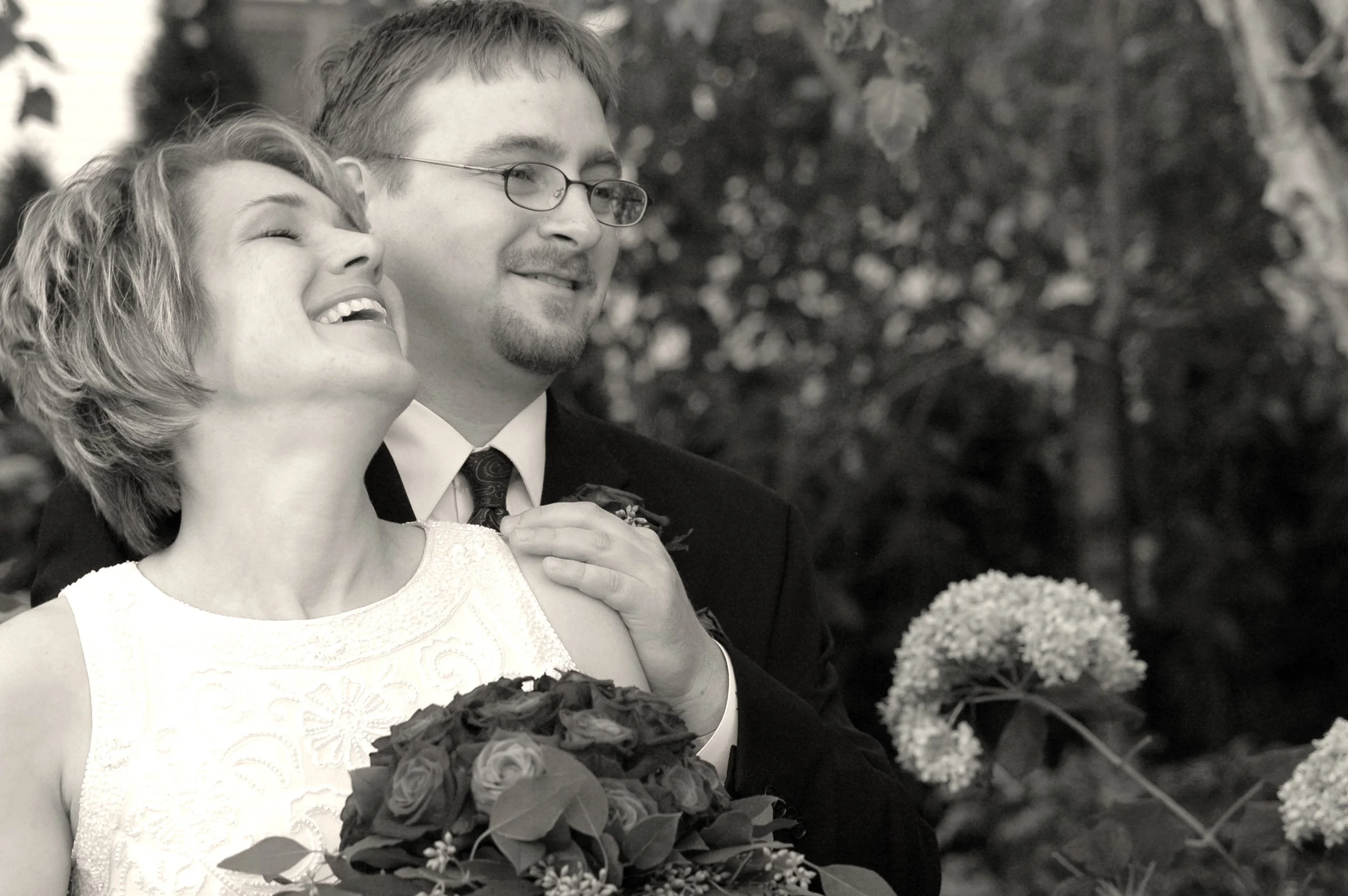 b&w bride laughing.jpeg