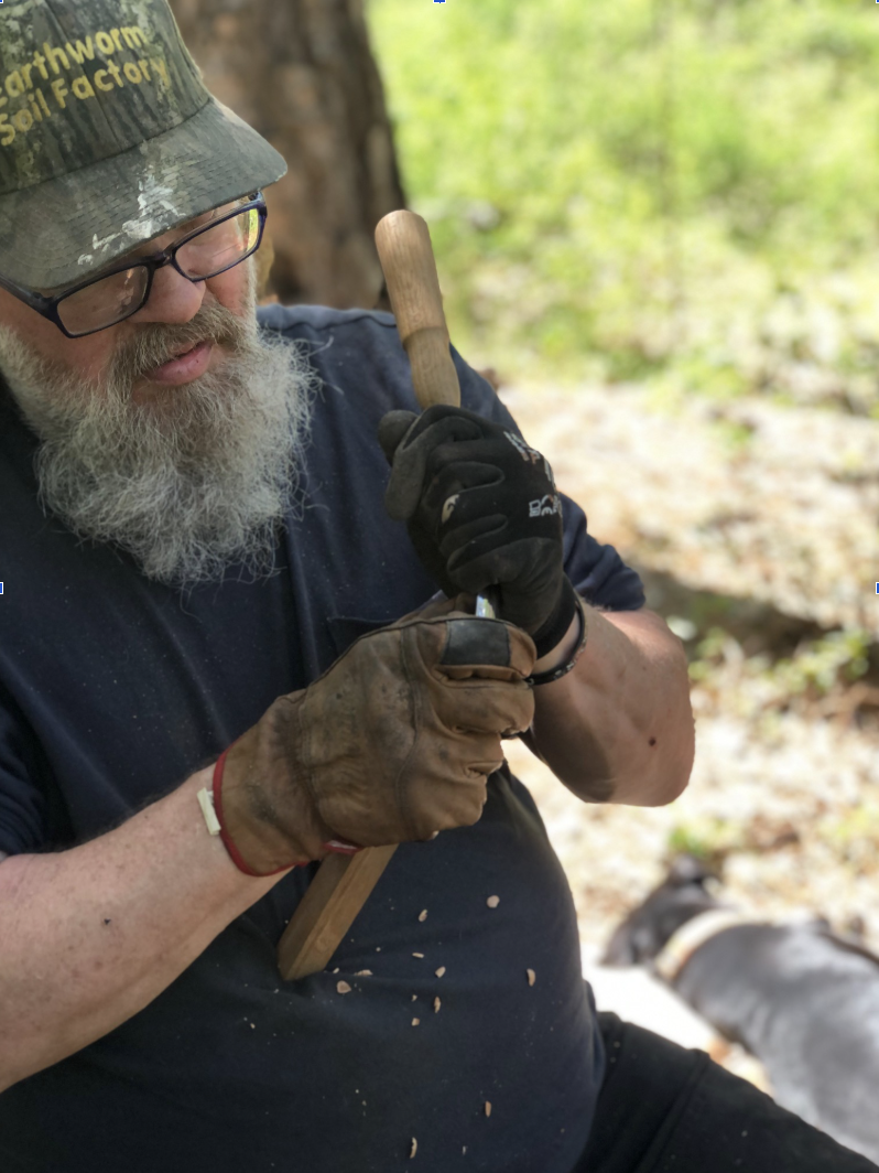 man in spoon carving class