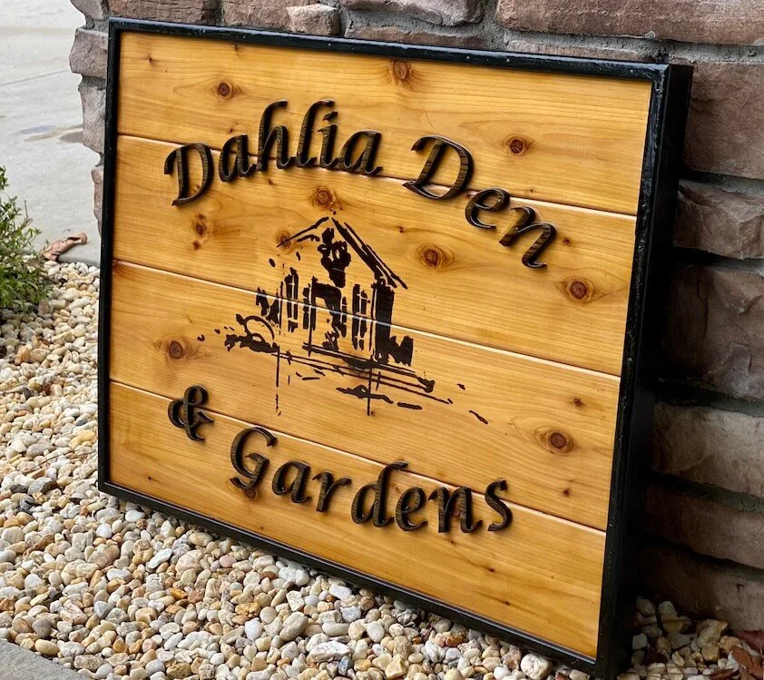 Custom Outdoor Cedar Sign for Dahlia Den & Gardens. The sign is made from Cedar wood and is sealed for the outdoors