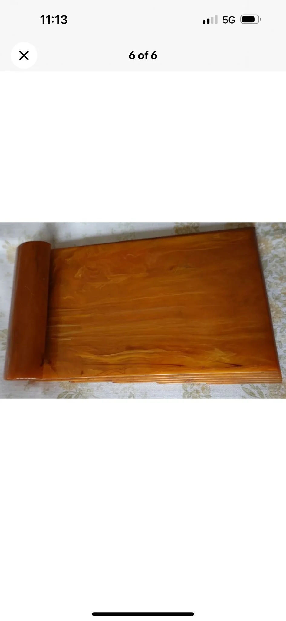 Vintage Carvacraft Wooden Serving Tray
A Carvacraft serving tray crafted from wood, featuring a distinctive rolled-up handle design. Displayed on a decorative fabric surface, this tray highlights Carvacraft’s characteristic craftsmanship and function