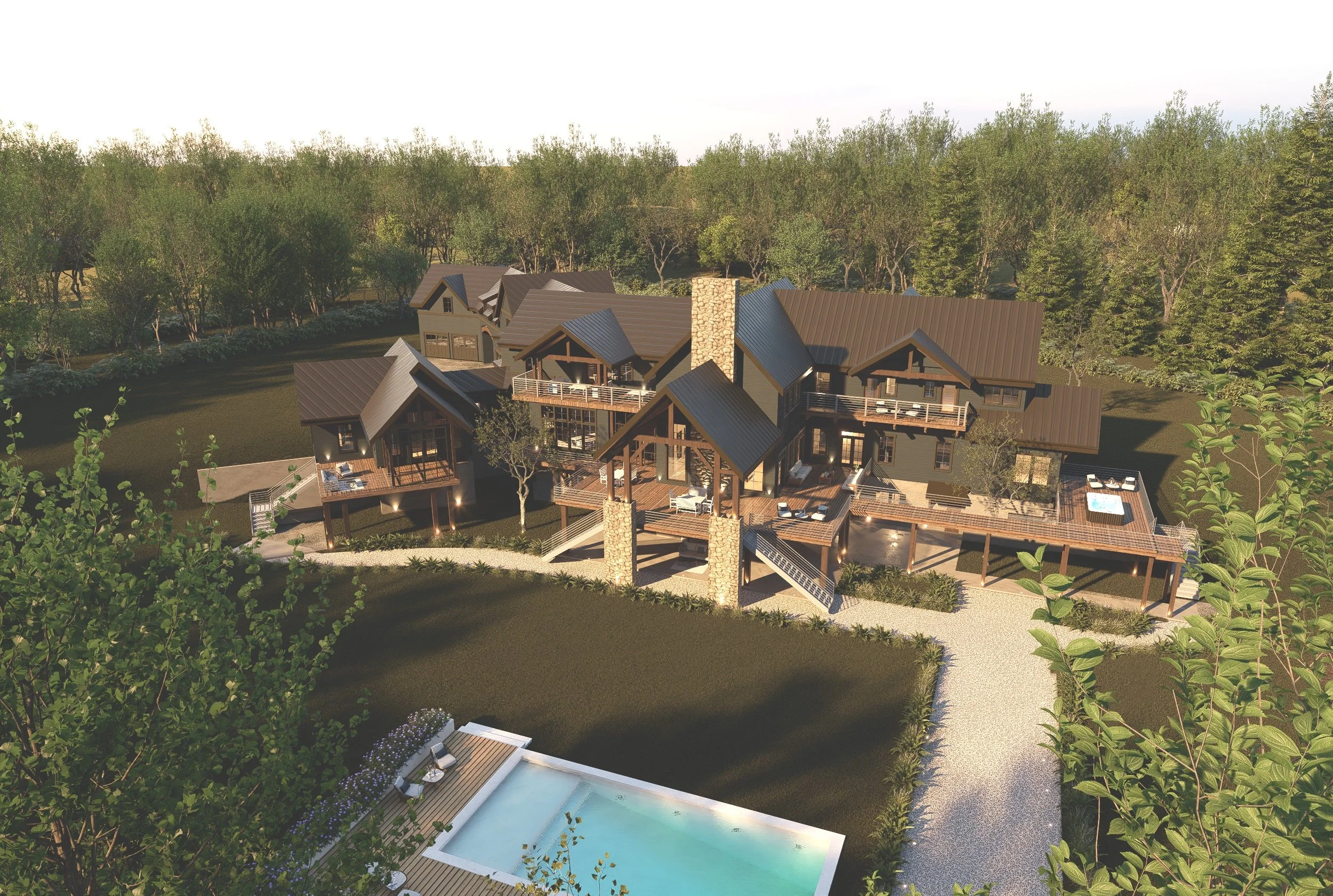 Aerial view of a large modern house with multiple roofs, decks, and outdoor amenities including a pool and hot tub, surrounded by trees.