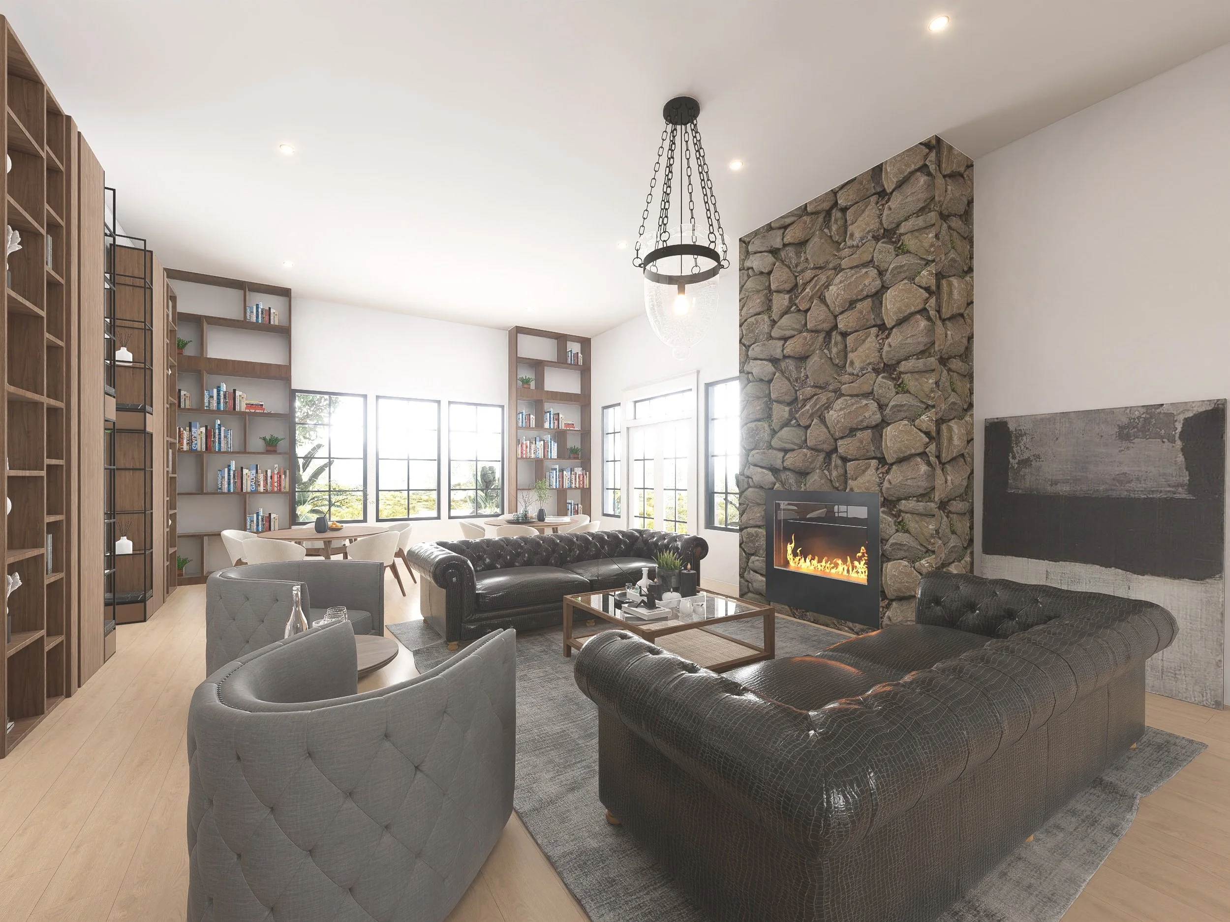Modern living room with stone fireplace, black leather sofas, gray armchairs, glass coffee table, built-in wooden bookshelves, large windows, and a chandelier.