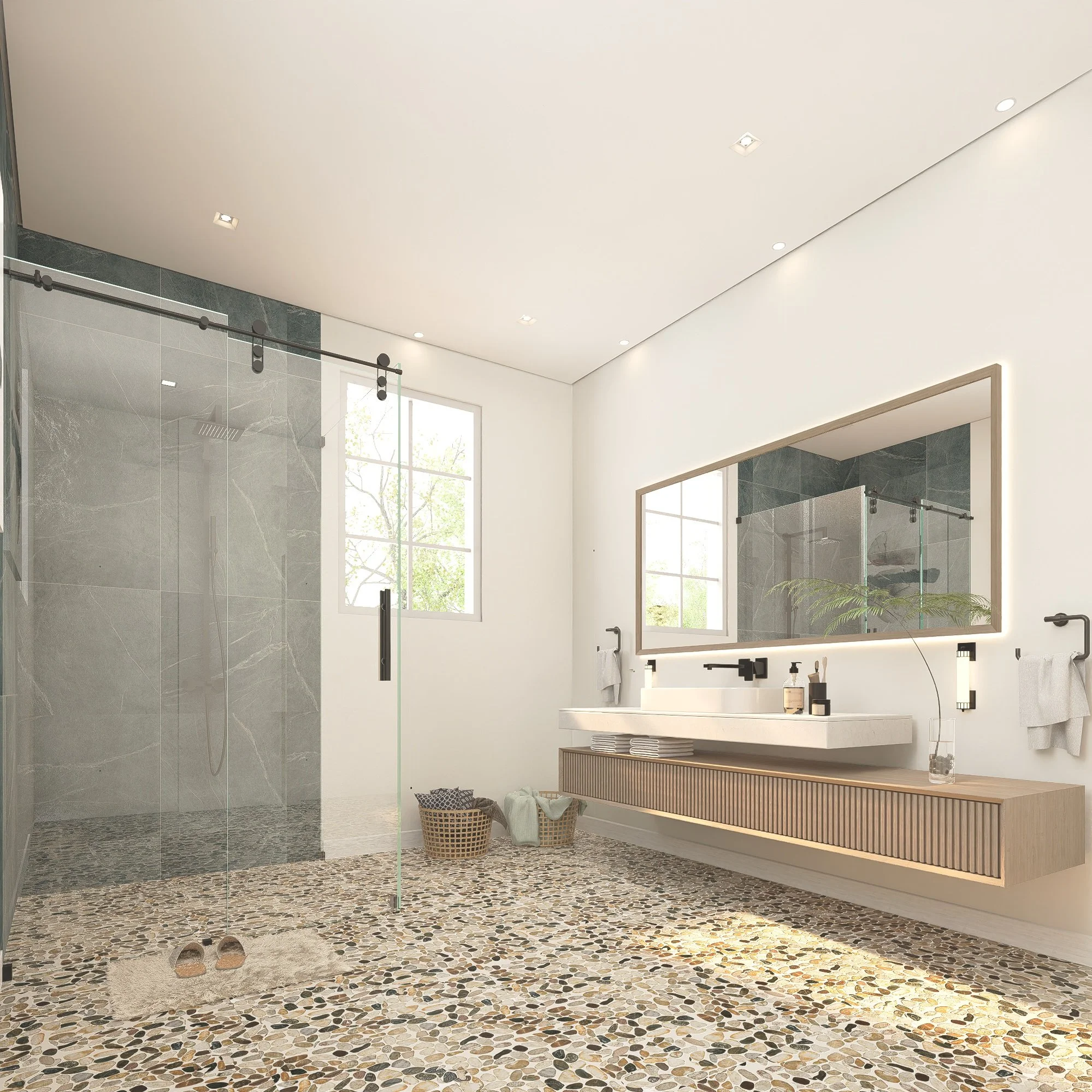 Modern bathroom with walk-in shower, large mirror, double sink, and pebble stone floor.