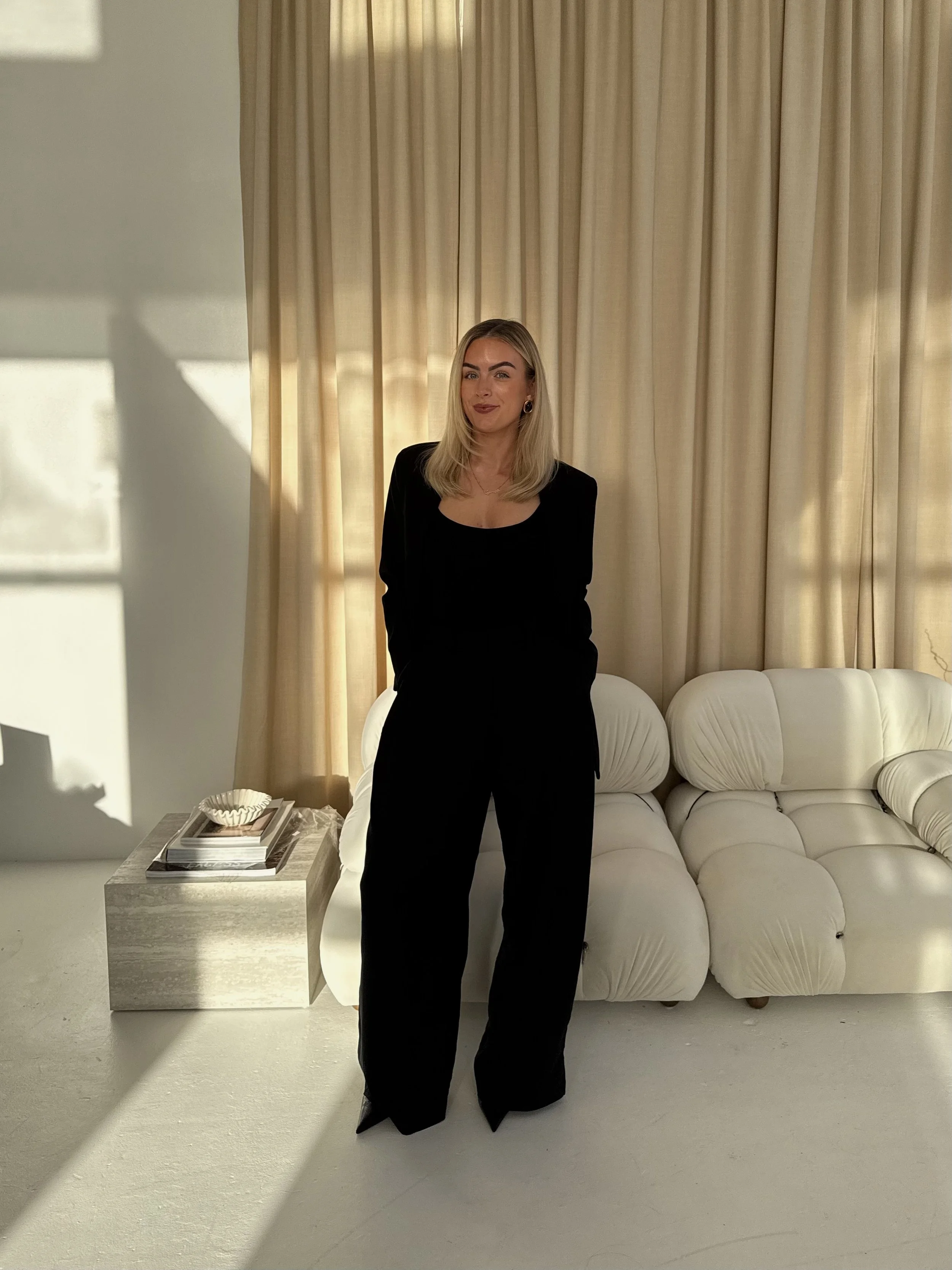 female founder standing in pose