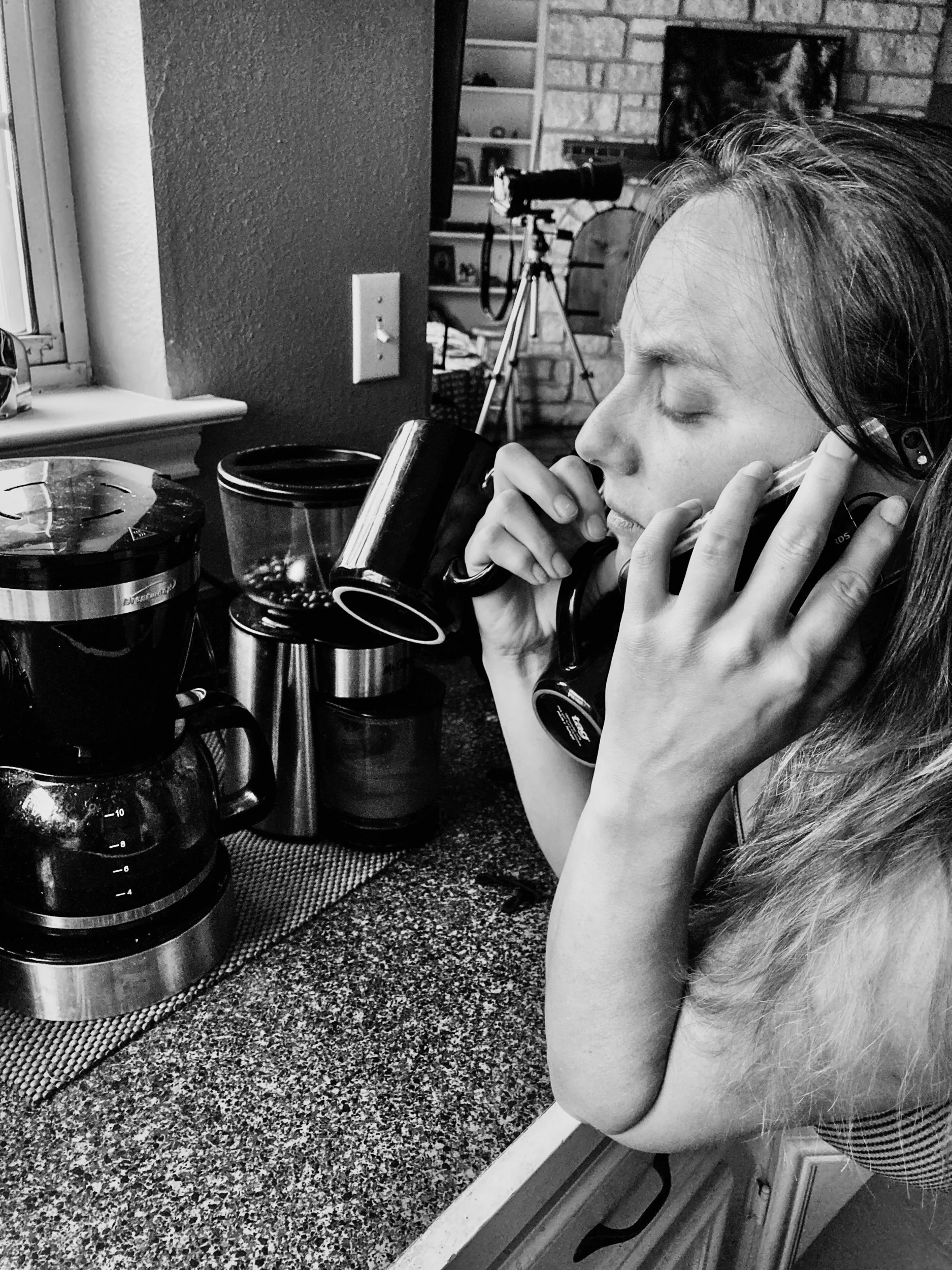 Amaya Collier, "Calls Before Coffee," 2021. My mom wakes up to make morning coffee for herself and me while taking work calls. Before breakfast, she confirms her plant and material delivery times for her landscape design business. Today's deliveries