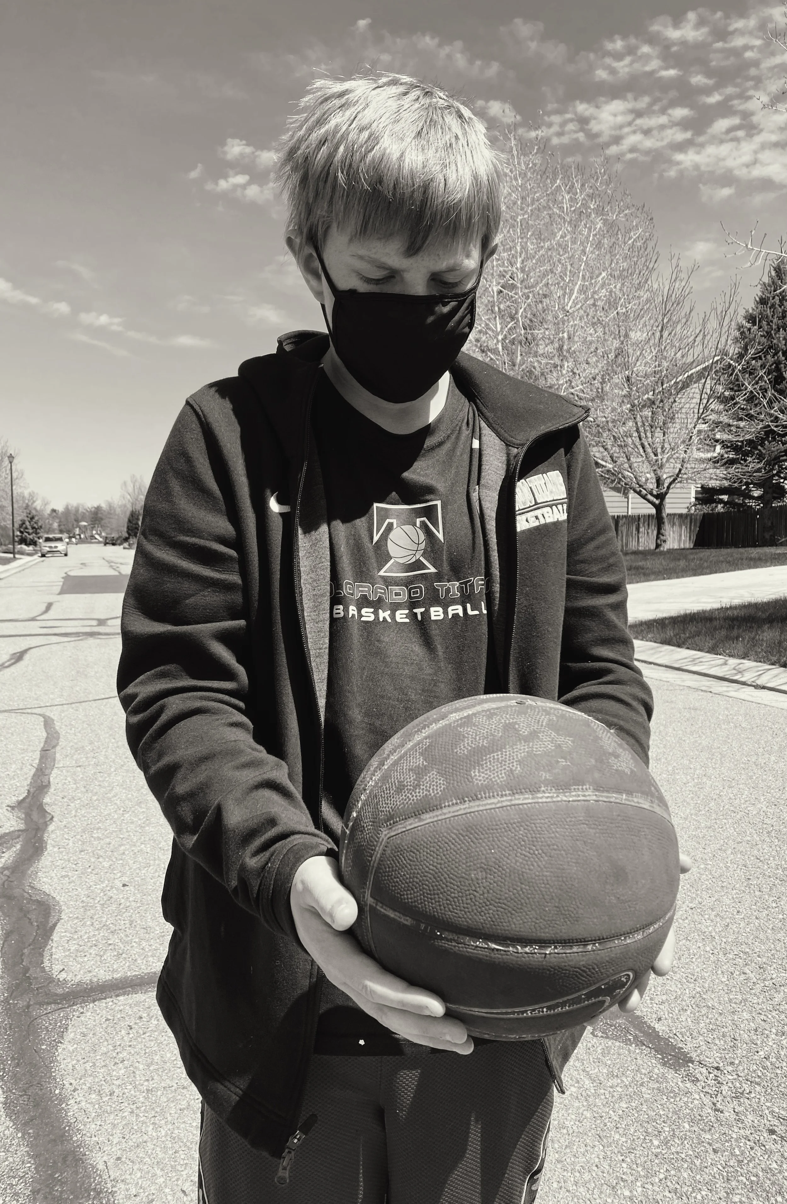 Emma Caile, "No We in Team," 2020. "Missing out on an entire season of summer basketball, my brother is sad, to say the least. He does have hopes that things will start up again, but he misses his teammates, friends, and brothers. "I hope I can step