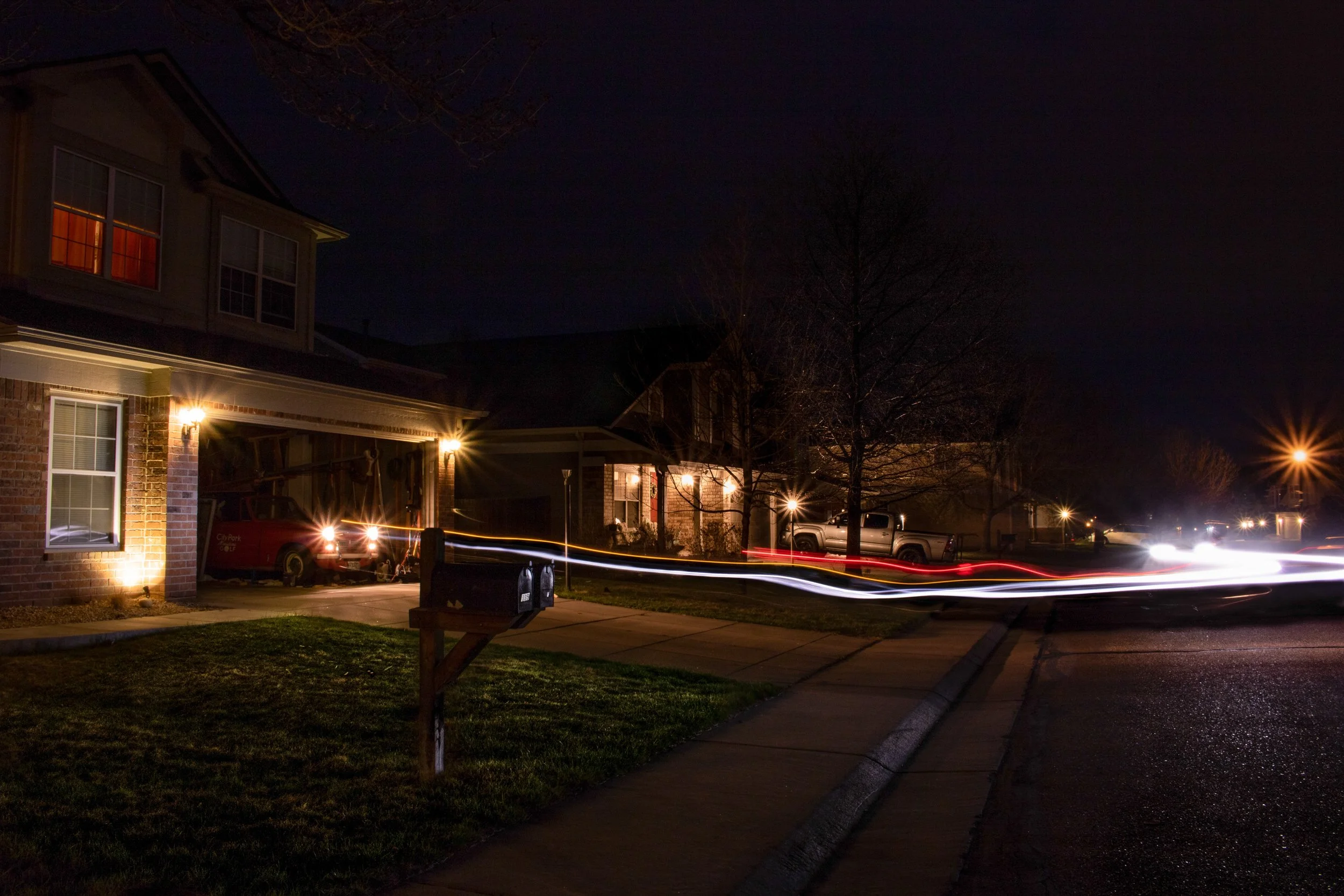 Alexis Lepetsos, "9 to 5," 2018. "This photo shows my mom pulling into our garage, returning from a long day at work. While the title is 9 To 5, the image shows her returning later than 5 p.m. indicating that work often requires more time than expect