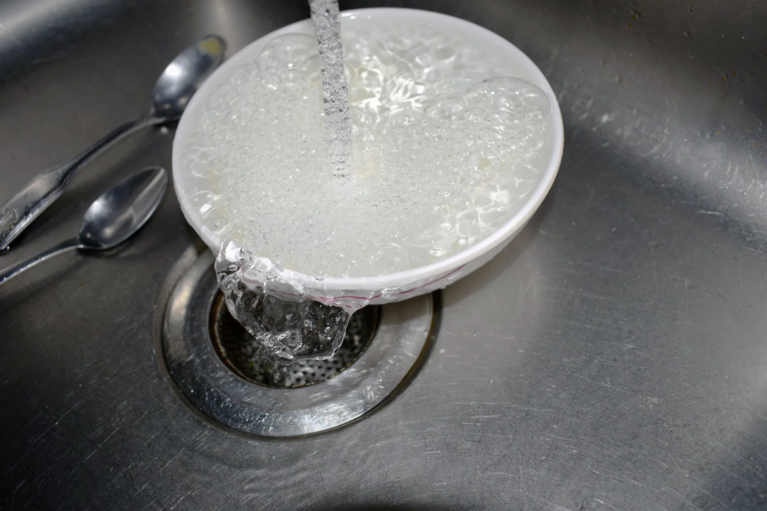 Leslie Garcia, "Helping Mom," 2019. "When my mom leaves to work, I help by finishing the dishes. It means a lot to her because she doesn’t have to clean after she comes home from work tired."