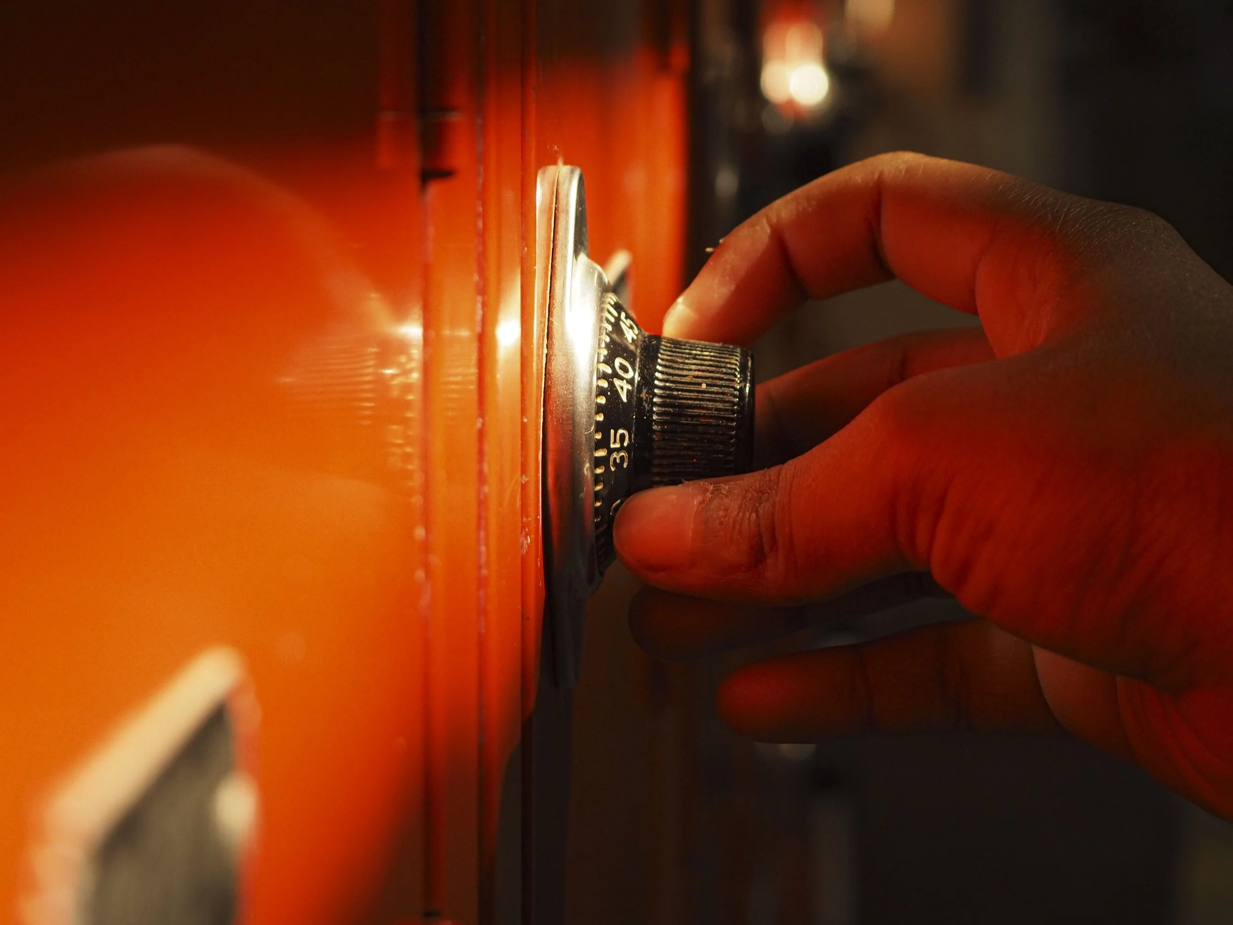 Nora Shaughnessy, "Student Life," 2022.
I’ve never taken the time to stop and observe what’s around me. This image captures me struggling while rushing to open a locker. We never really take the time to pause and think about the present. Our lives ha