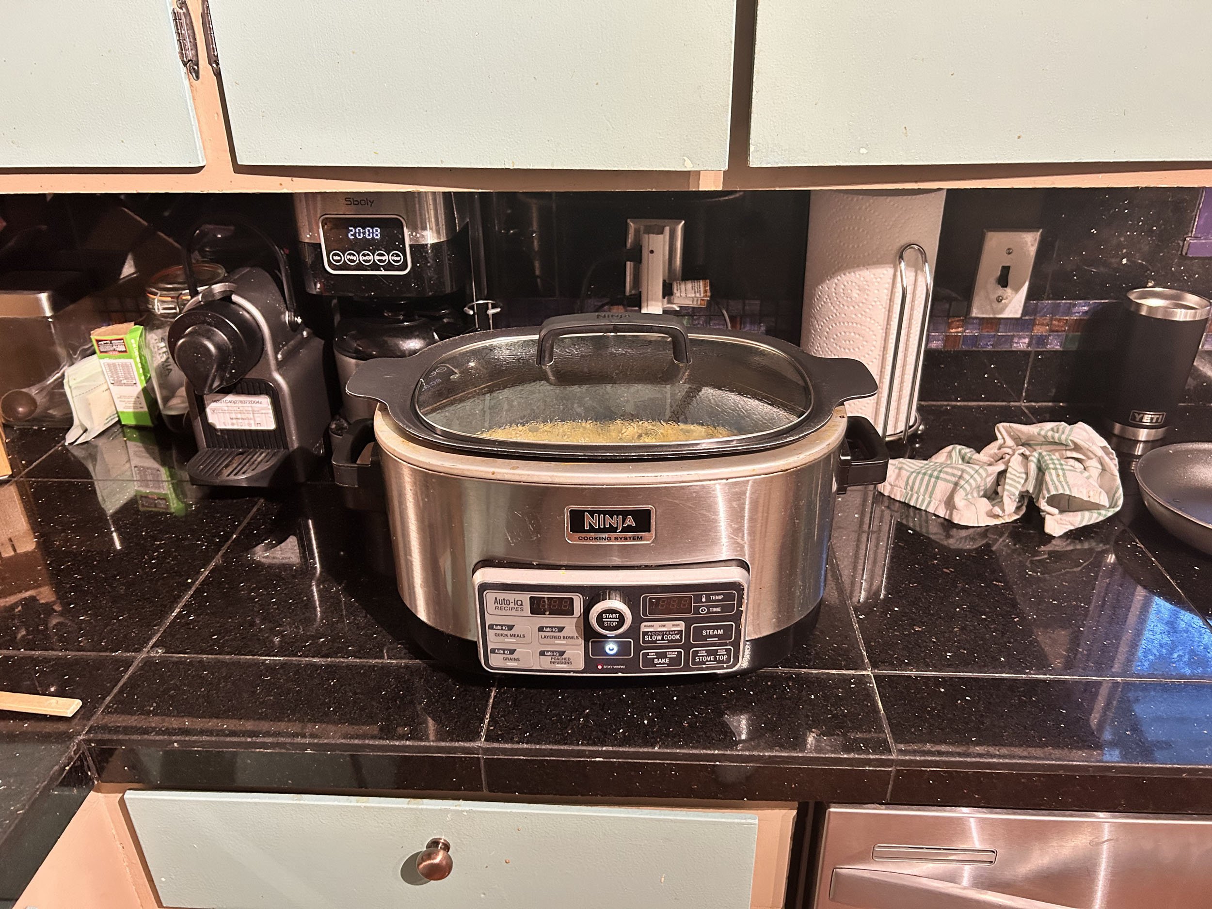 Darby Roldan, "Easy Dinner," 2023. This is our family's slow cooker. My dad always makes dinner for us, but he has to work 7 days a week, so there really isn't too much time to prepare dinner throughout the day. He uses the slow cooker to his advanta
