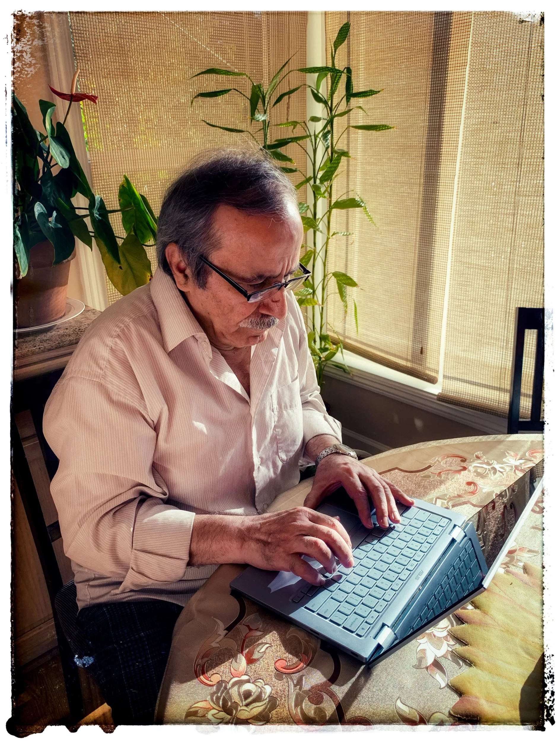 Niloofar Sahimi, "Nostalgic Satisfactions," 2021. Since my dad cannot work at his university's office, he tends to use my laptop for work. It sometimes becomes frustrating as he is always sitting and working, although it does signify satisfying momen