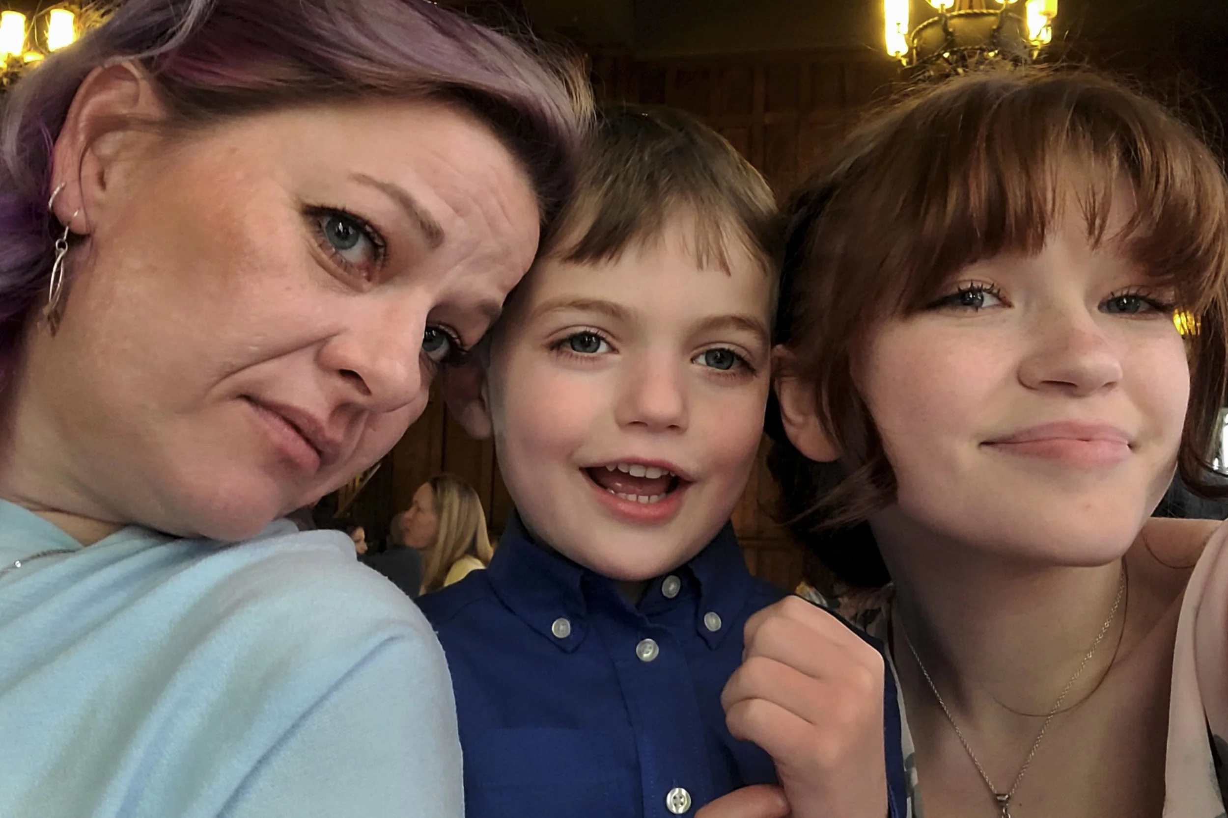 Theia Jergensen, "Aksel," 2022.
This photo is a representation of how family can bring people together, despite their individual challenges. On the left is my mom, who I have a rather rocky relationship with. But, in between us is Aksel, my five-year