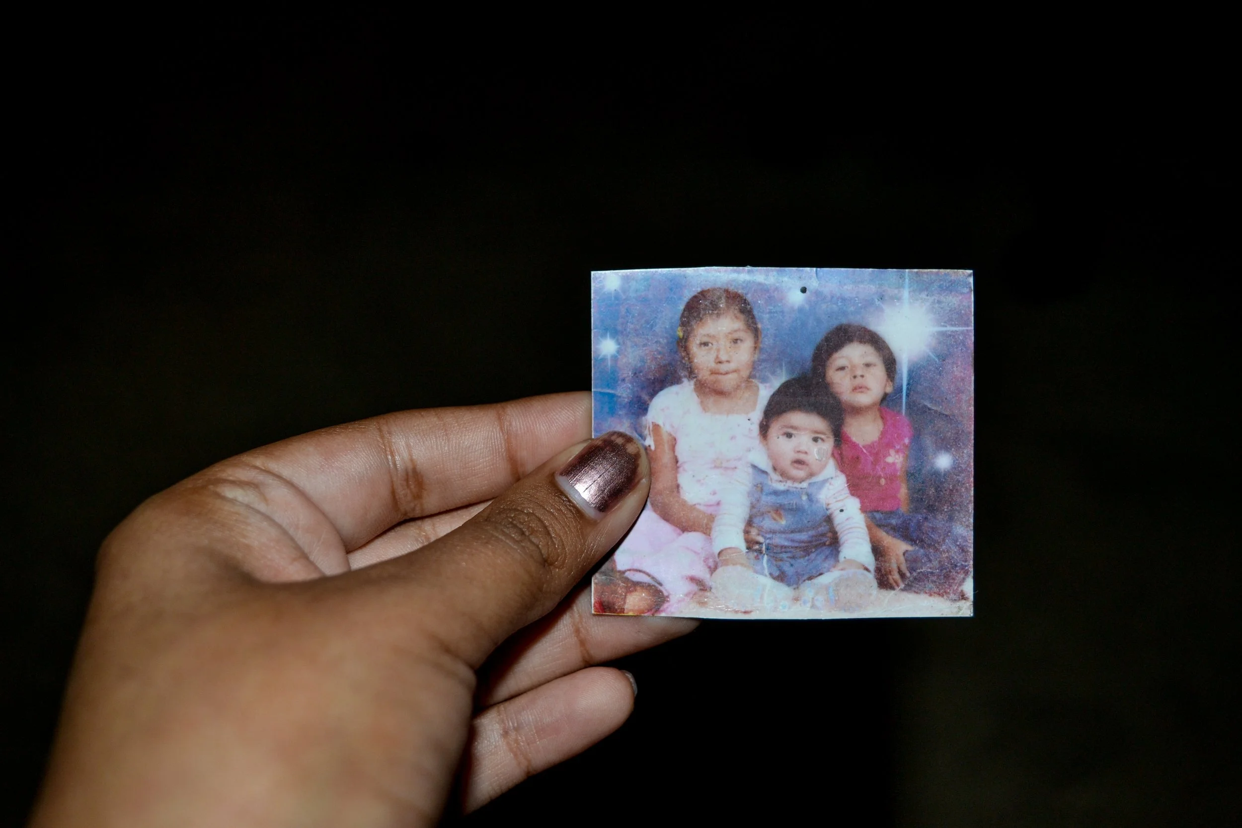 Cynthia Carmago, "My Father's Motivation," 2017. 
I ask my father if he has a picture that he carries in his wallet at all times. He shows me a picture of my brother, sister, and me and tells me that when he is tired and needs motivation, he looks at