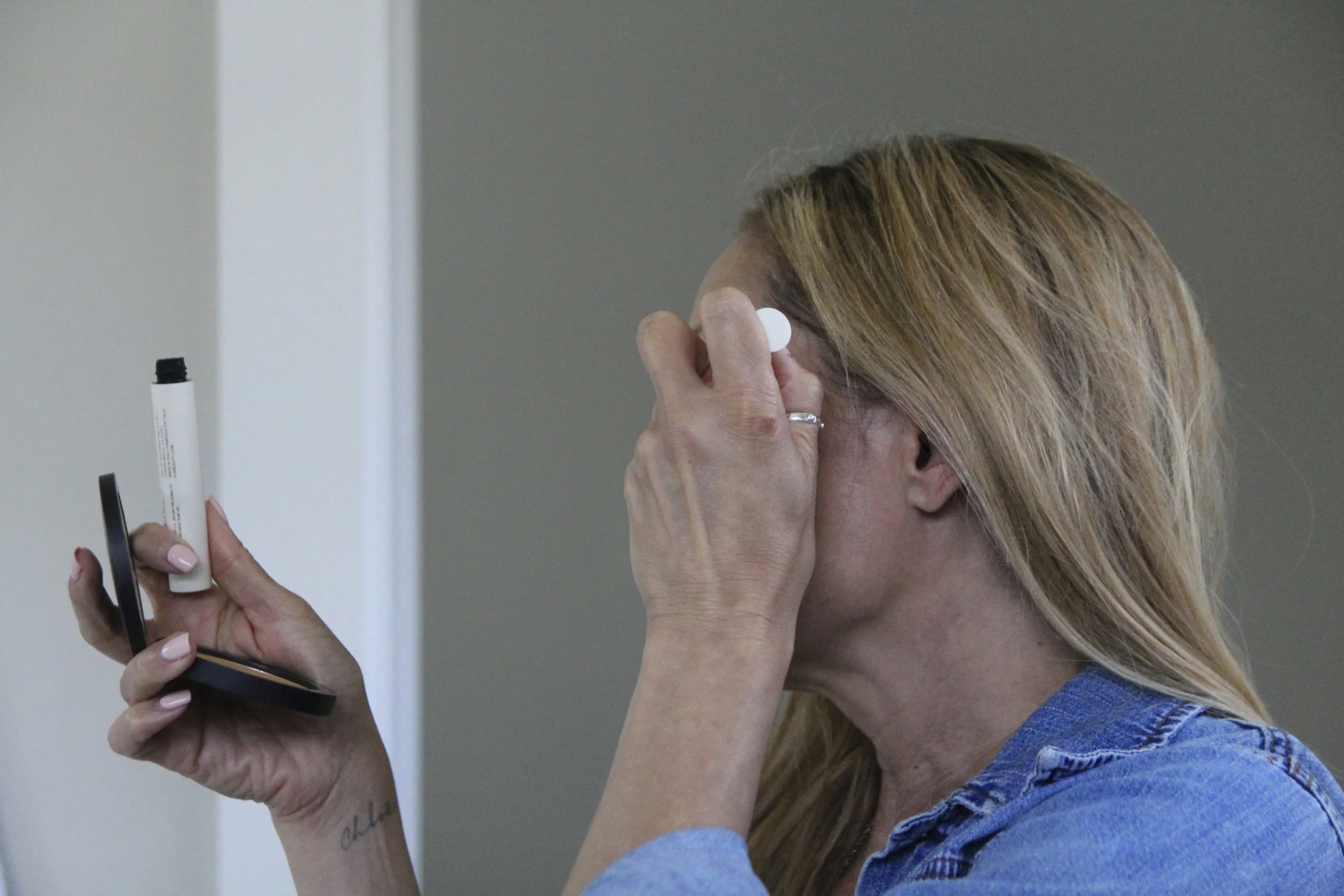 Chloe Lewcock, "Another Day," 2022.
My mom puts on her makeup like another typical day. She wakes up early with me as we both get ready for our days. We drive to school, talk about what’s upcoming and spend time together, and then she goes off to wor