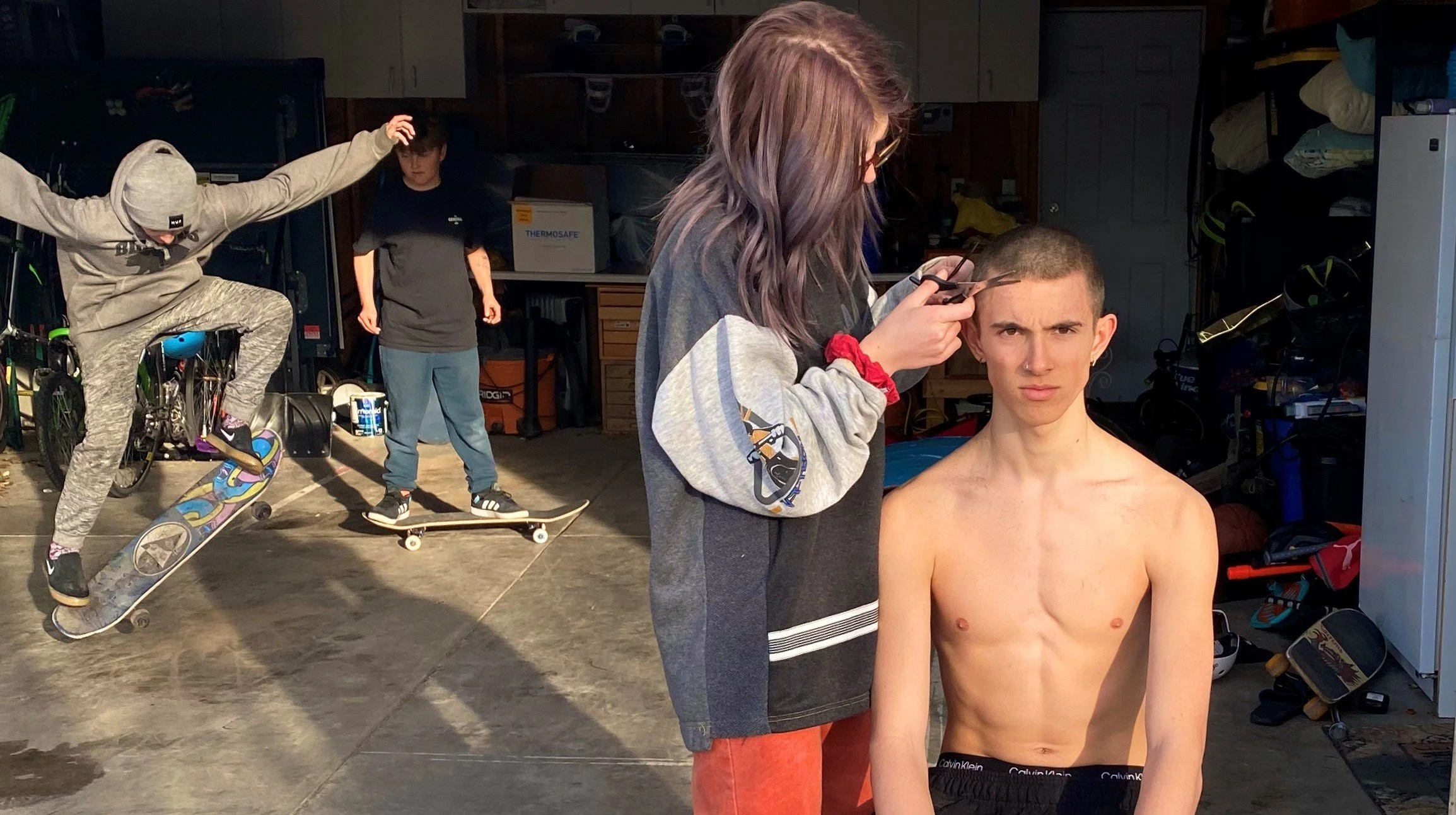 Ethan Mills, "The Cut," 2020. "My family is always very busy with work or sports for my brothers, so to help them with that, I tend to get my haircuts at home by whoever is willing to give them. This specific time, it happened to be by my girlfriend