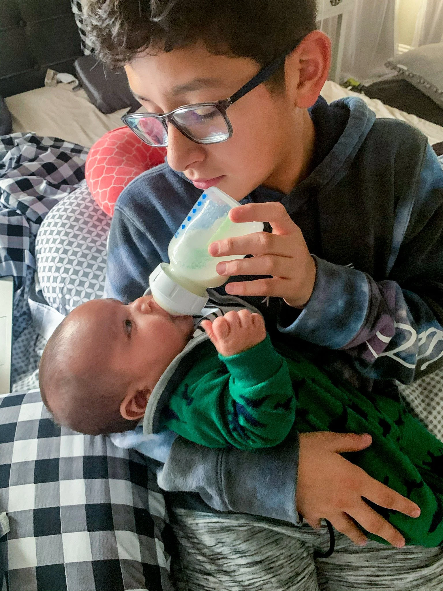 Joshua Garcia, "Brothers’ Love," 2021. While our parents are gone for work, my brothers and I are left at home to take care of the baby. We are happy to help, although sometimes it can be difficult to take care of a baby and skin simultaneously.